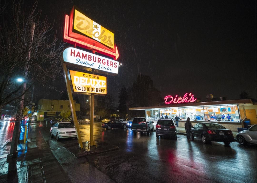 A Dick's Drive-In at night.