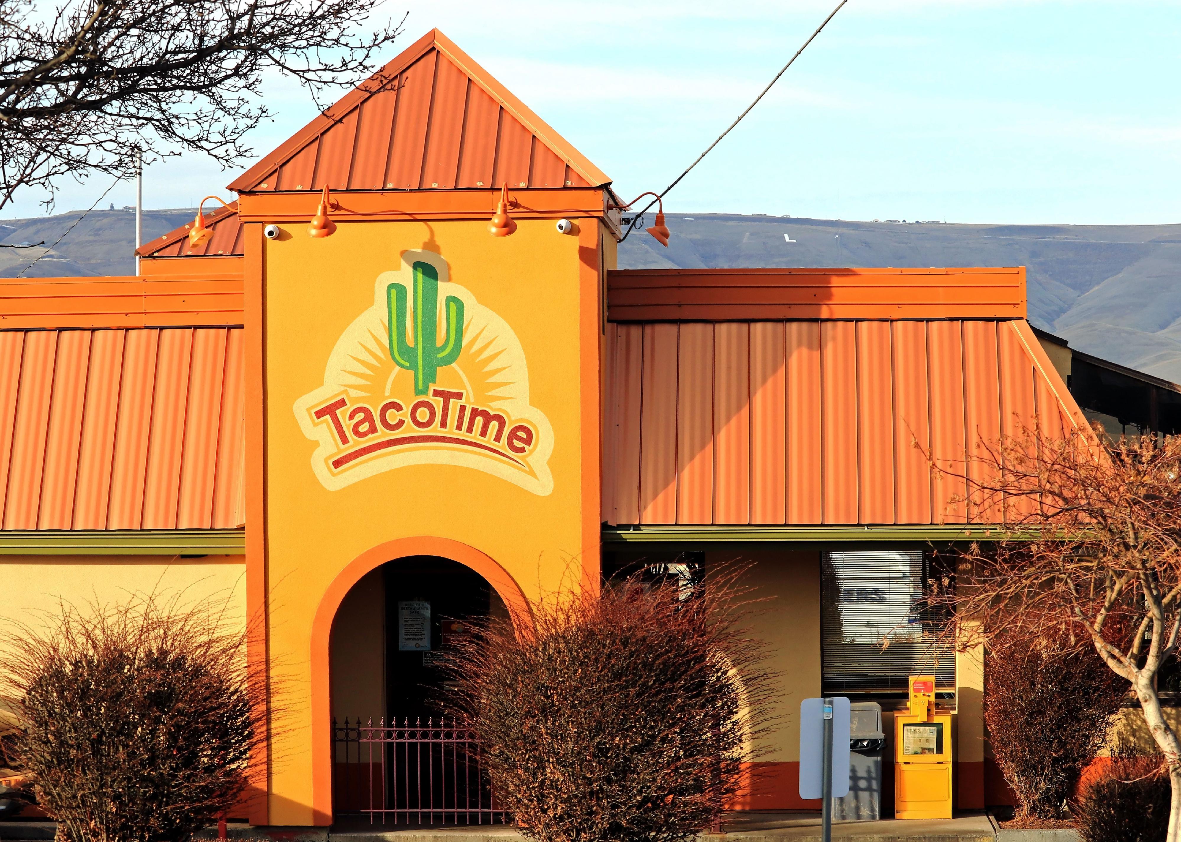 An orange Taco Time restaurant.
