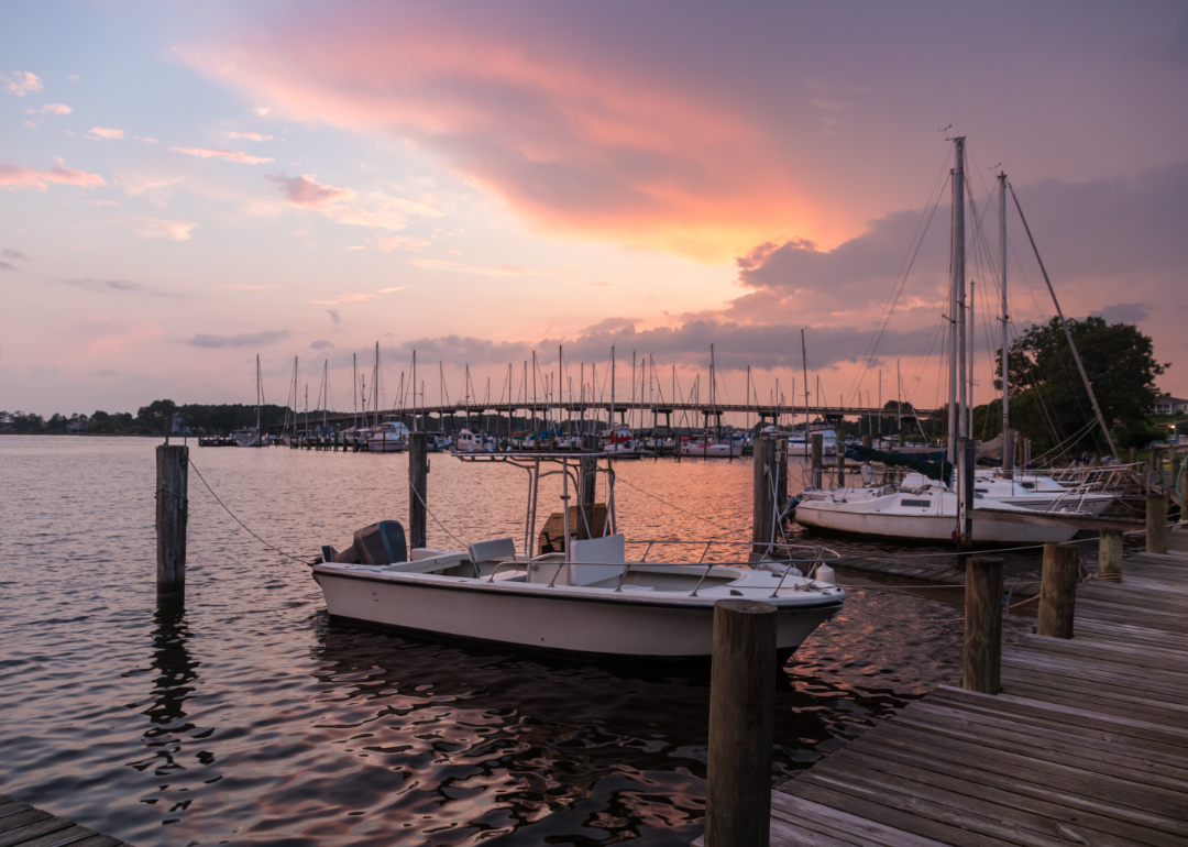 Boats docked at sunsets. 
