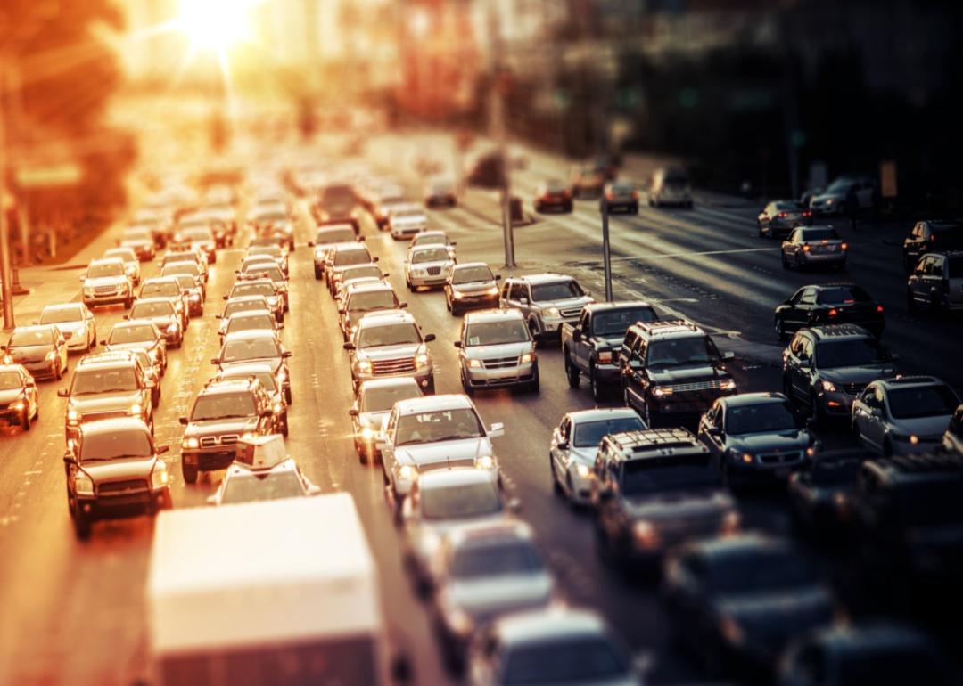 Traffic congestion on a bright sunny highway.