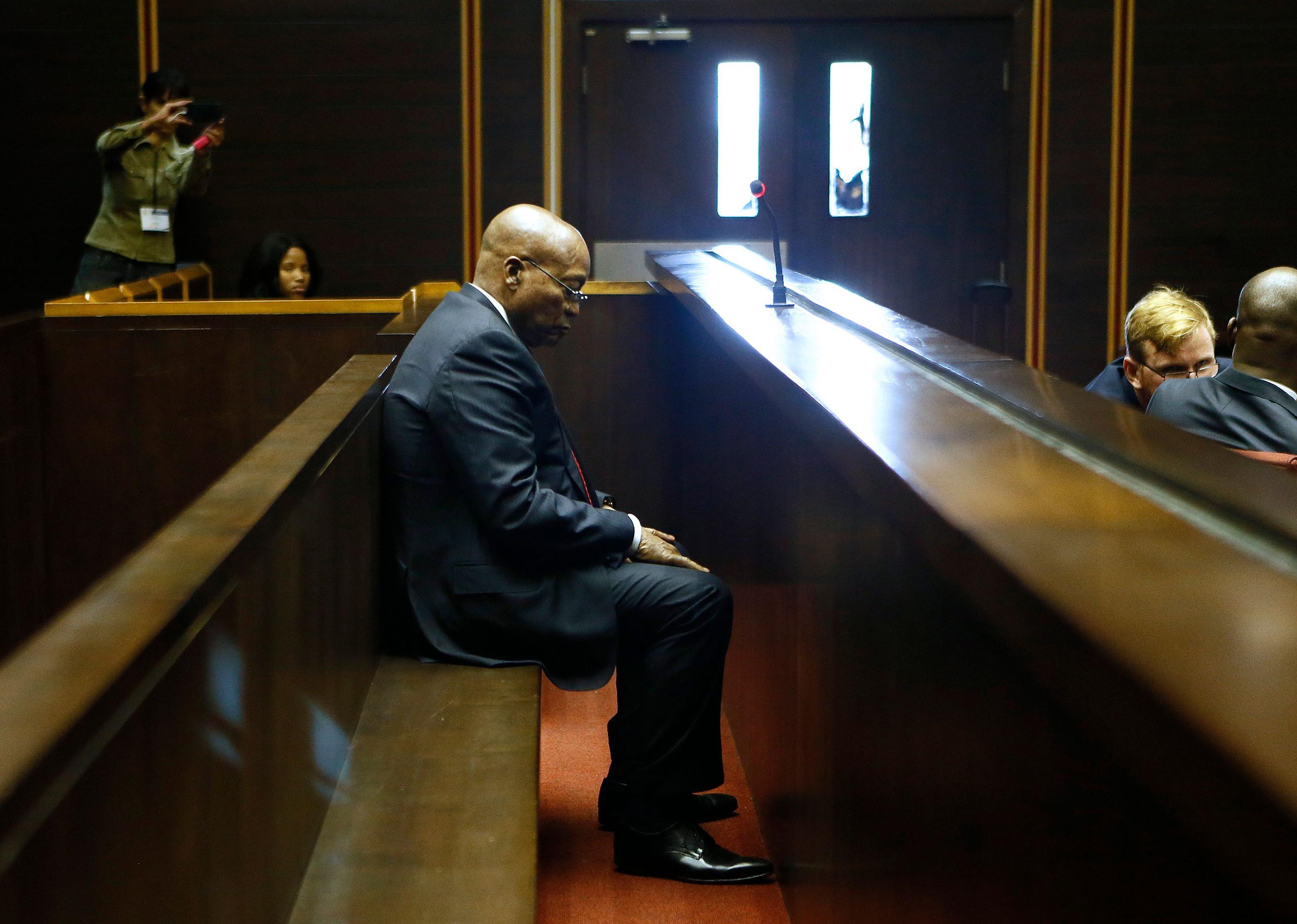 Jacob Zuma sits in the dock of the High Court of Pietermaritzburg