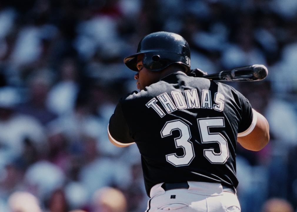 Frank Thomas of the Chicago White Sox eyes the ball as he swings his bat.