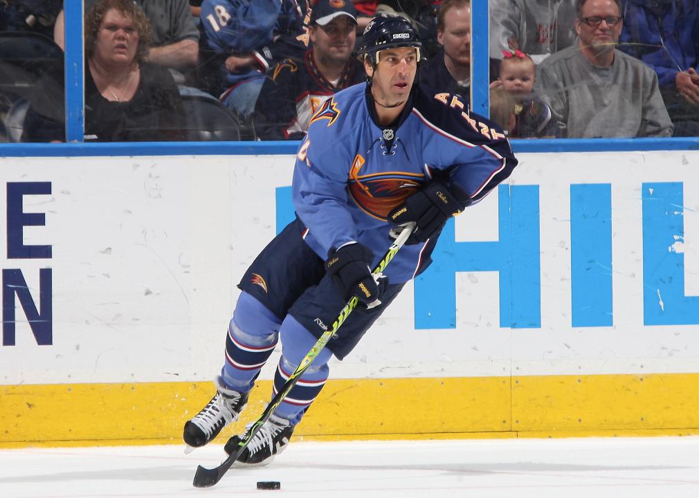 Chris Chelios carries the puck against the New Jersey Devils
