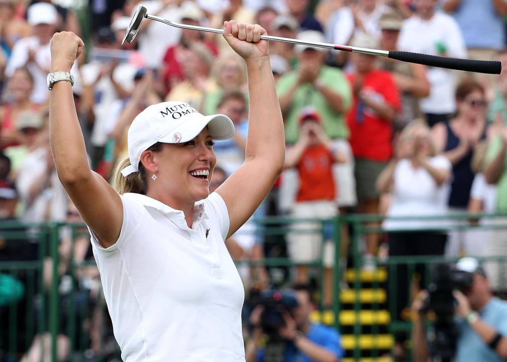 Cristie Kerr celebrates her 12-stroke victory on the 18th green after winning the LPGA Championship 
