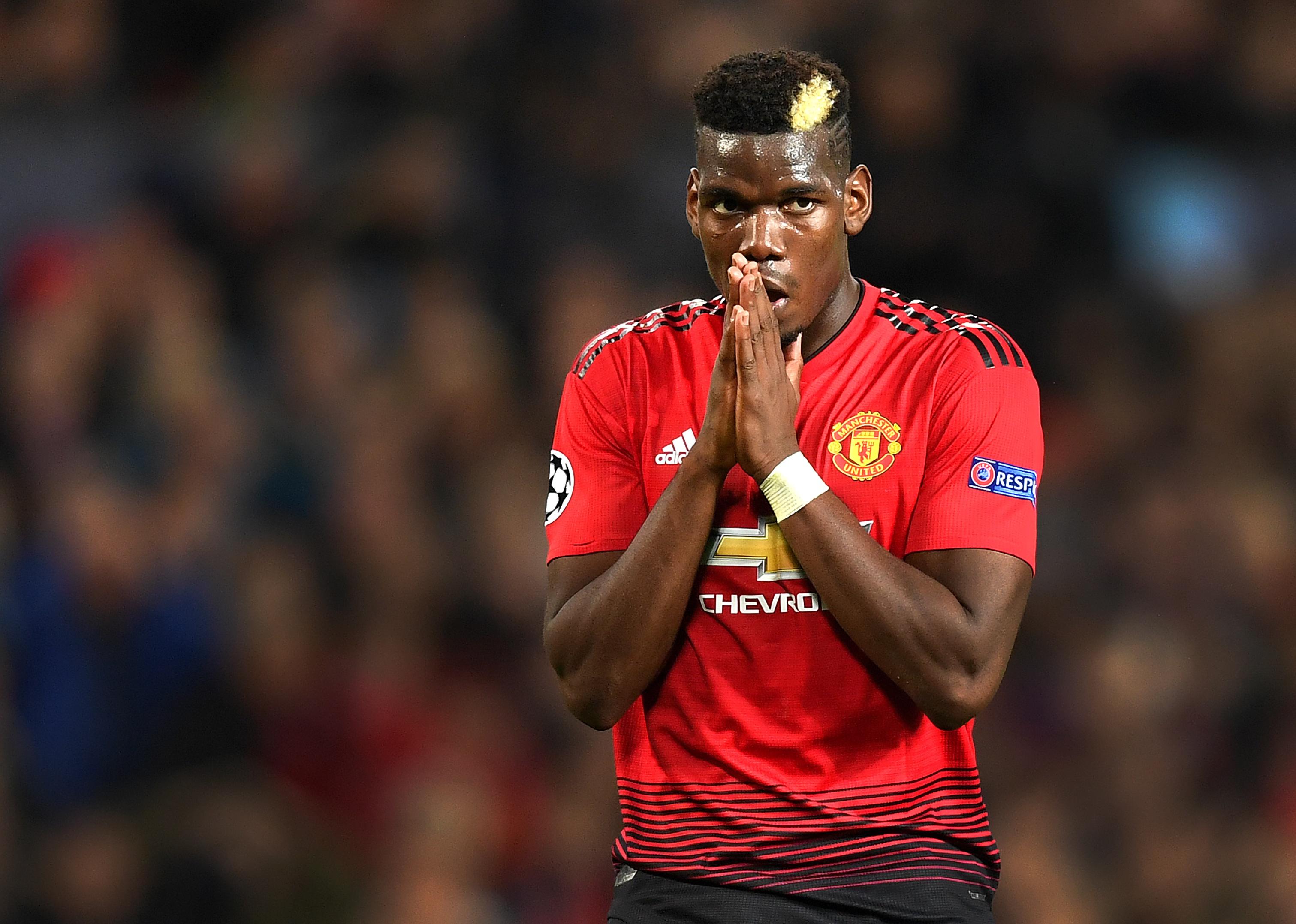 Paul Pogba of Manchester United looks dejected after hitting the post 