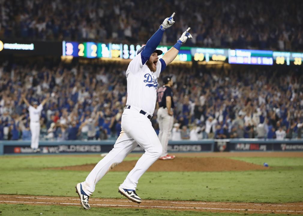 Max Muncy celebrates his walk-off home run to defeat the Boston Red Sox in Game Three of the 2018 World Series.