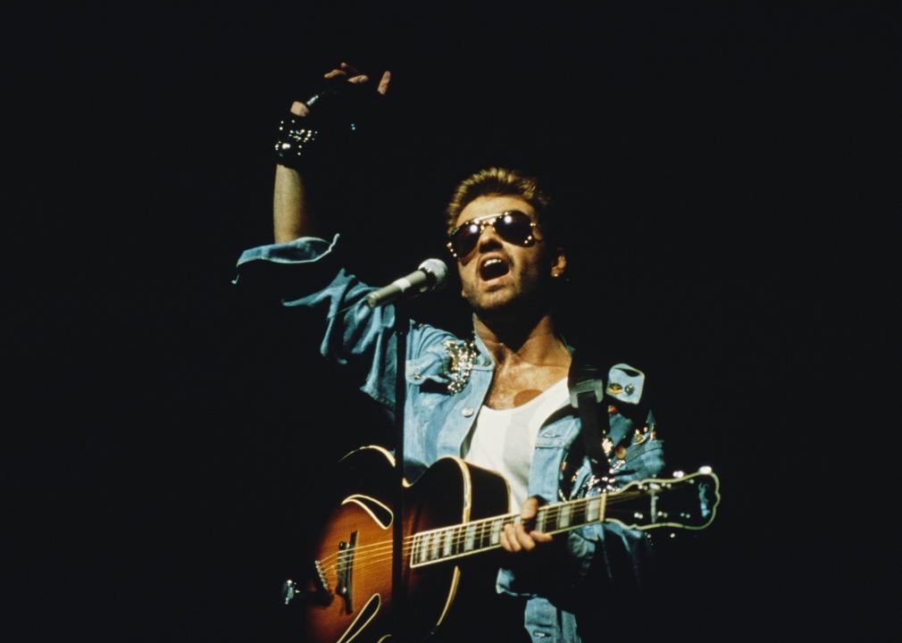 George Michael performing on stage.