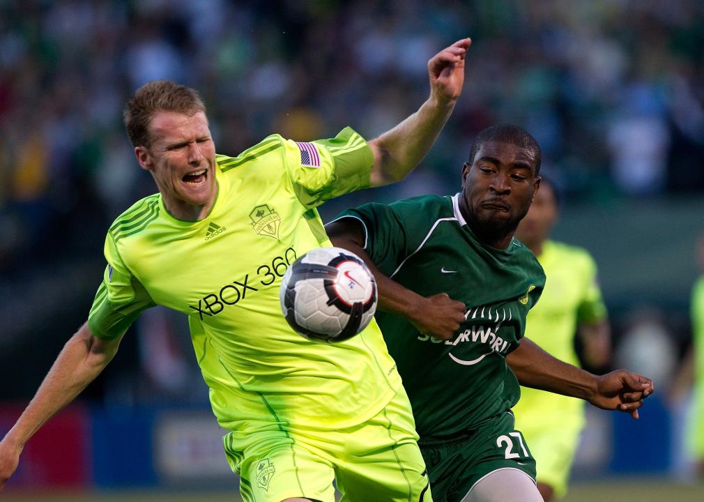 Taylor Graham of Seattle Sounders battles Bright Dike of the Portland Timbers during the Lamar Hunt U.S Open Cup in 2010