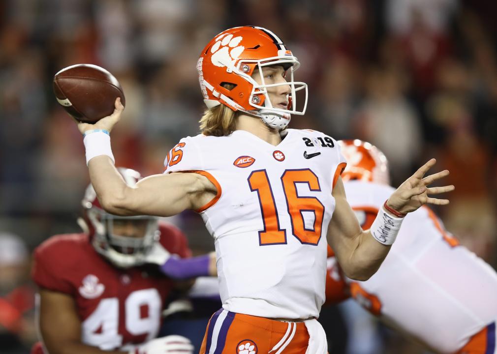 Trevor Lawrence of the Clemson Tigers attempts a pass during the National Championship.