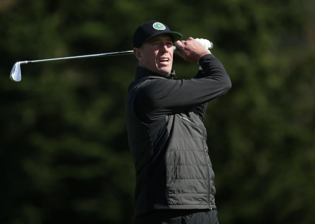 NFL player Matt Ryan plays his shot from the third tee 