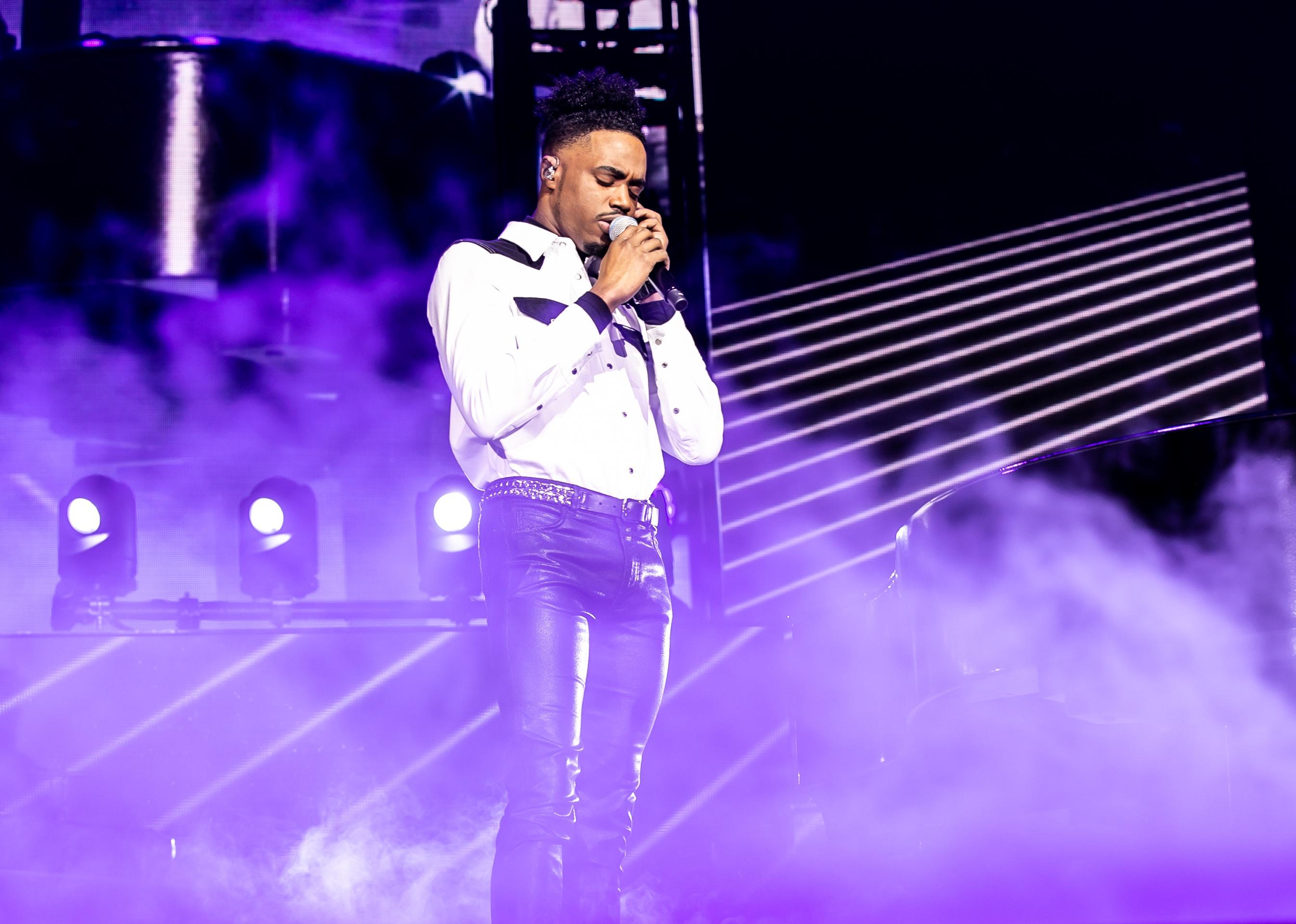 Dalton Harris performs during The X Factor Live Tour on stage.