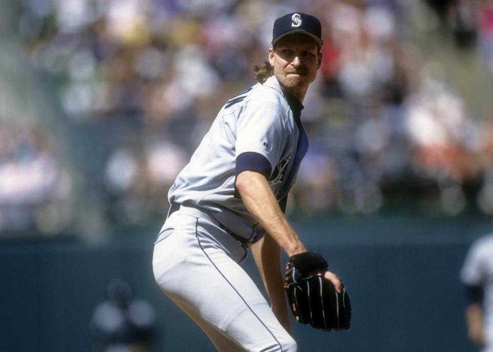 Randy Johnson #51 of the Seattle Mariners pitches during a game.
