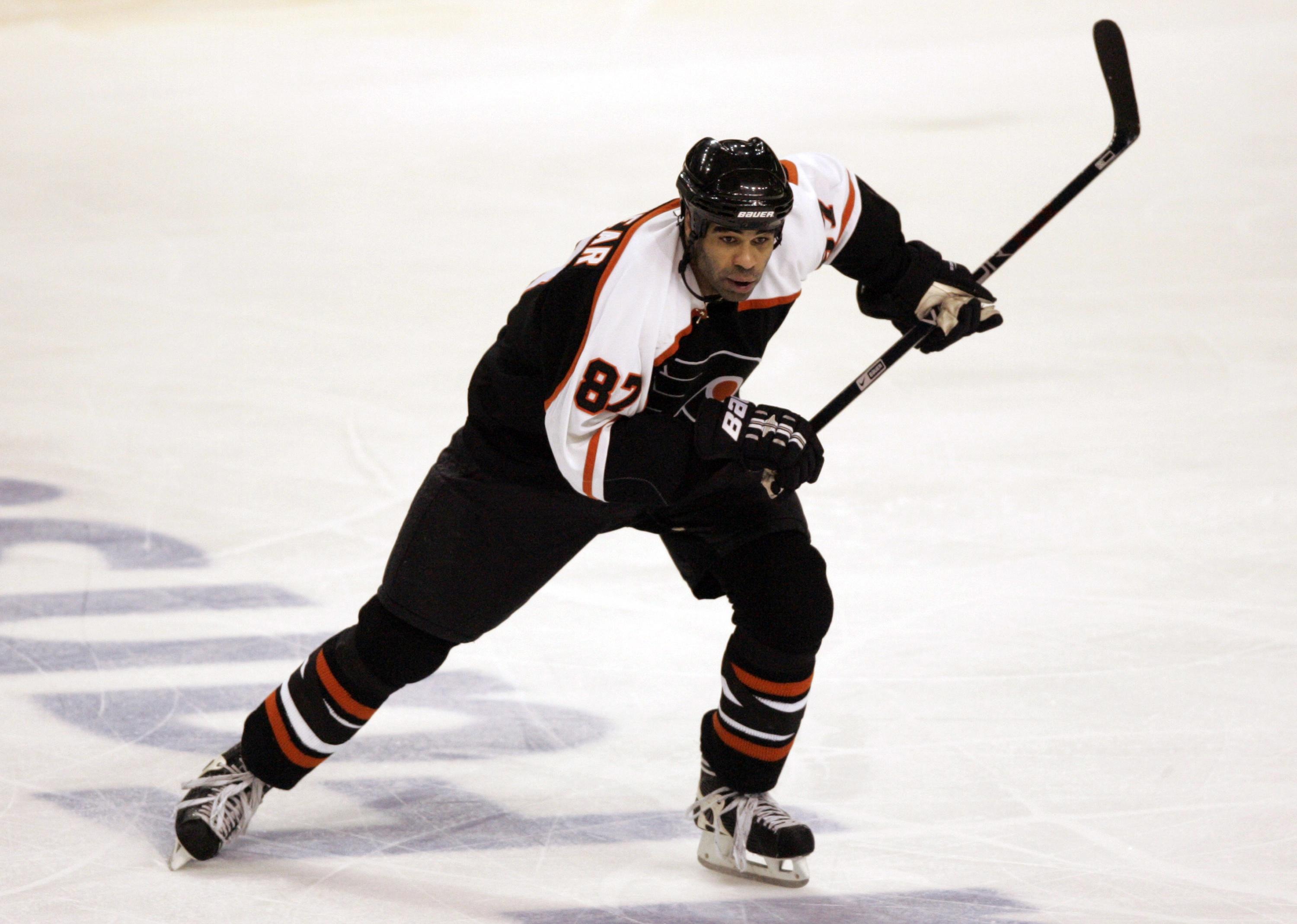 Flyers defenseman Donald Brashear skates up the ice.