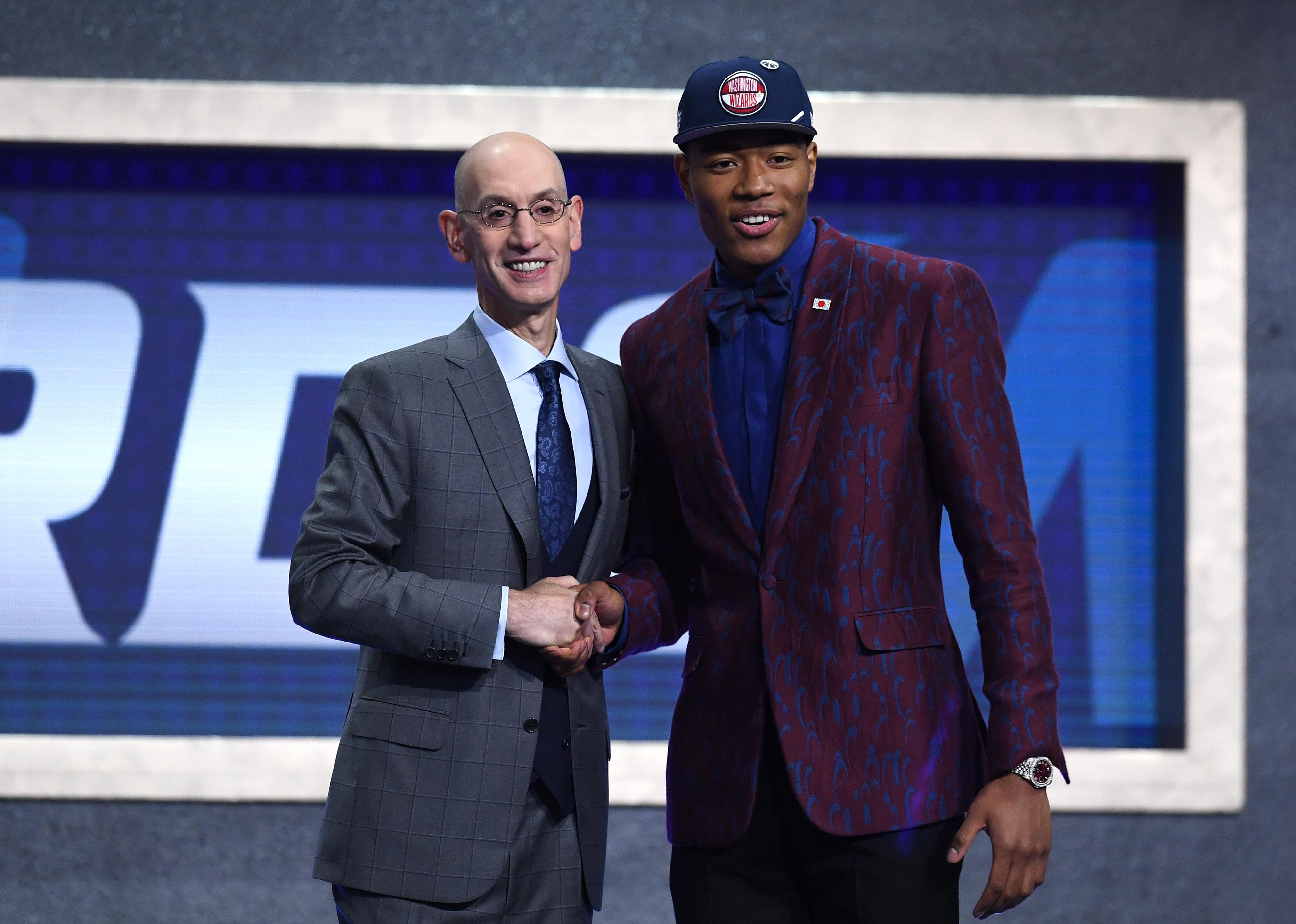 Rui Hachimura with NBA Commissioner Adam Silver after being drafted.