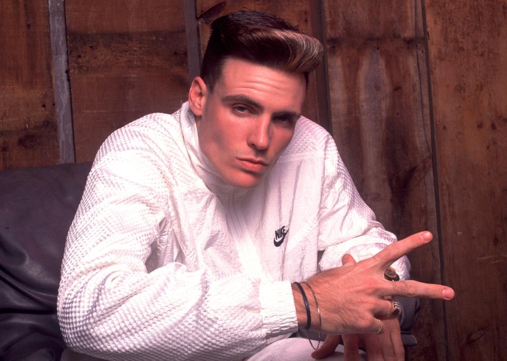 Portrait of singer Vanilla Ice backstage at a club.