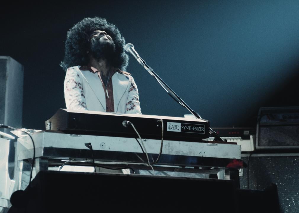 Billy Preston plays a variety of keyboards on stage circa 1974.