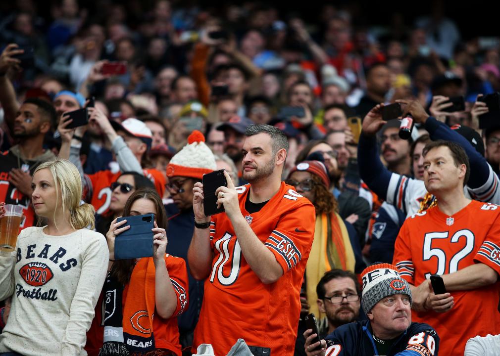 Chicago Bears fans watch the NFL match between the Bears and Oakland Raiders at Tottenham Hotspur Stadium.