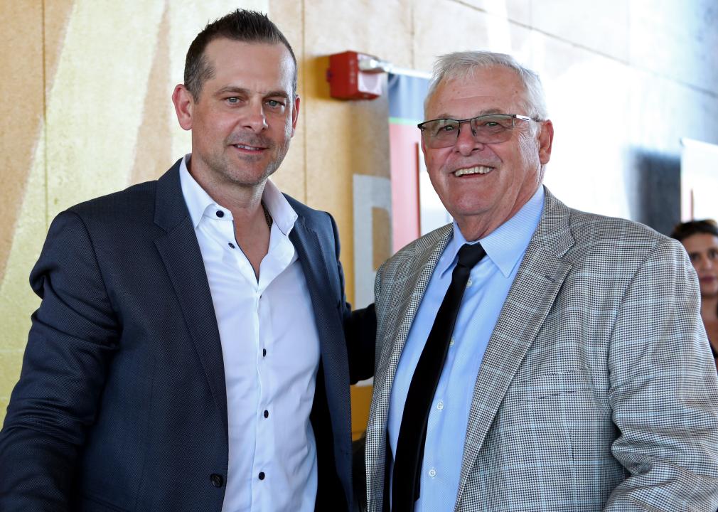 Aaron Boone poses for a photo with his dad, Bob Boone.