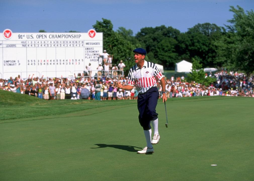 Payne Stewart celebrates after holing his putt on the 18th green during the US Open
