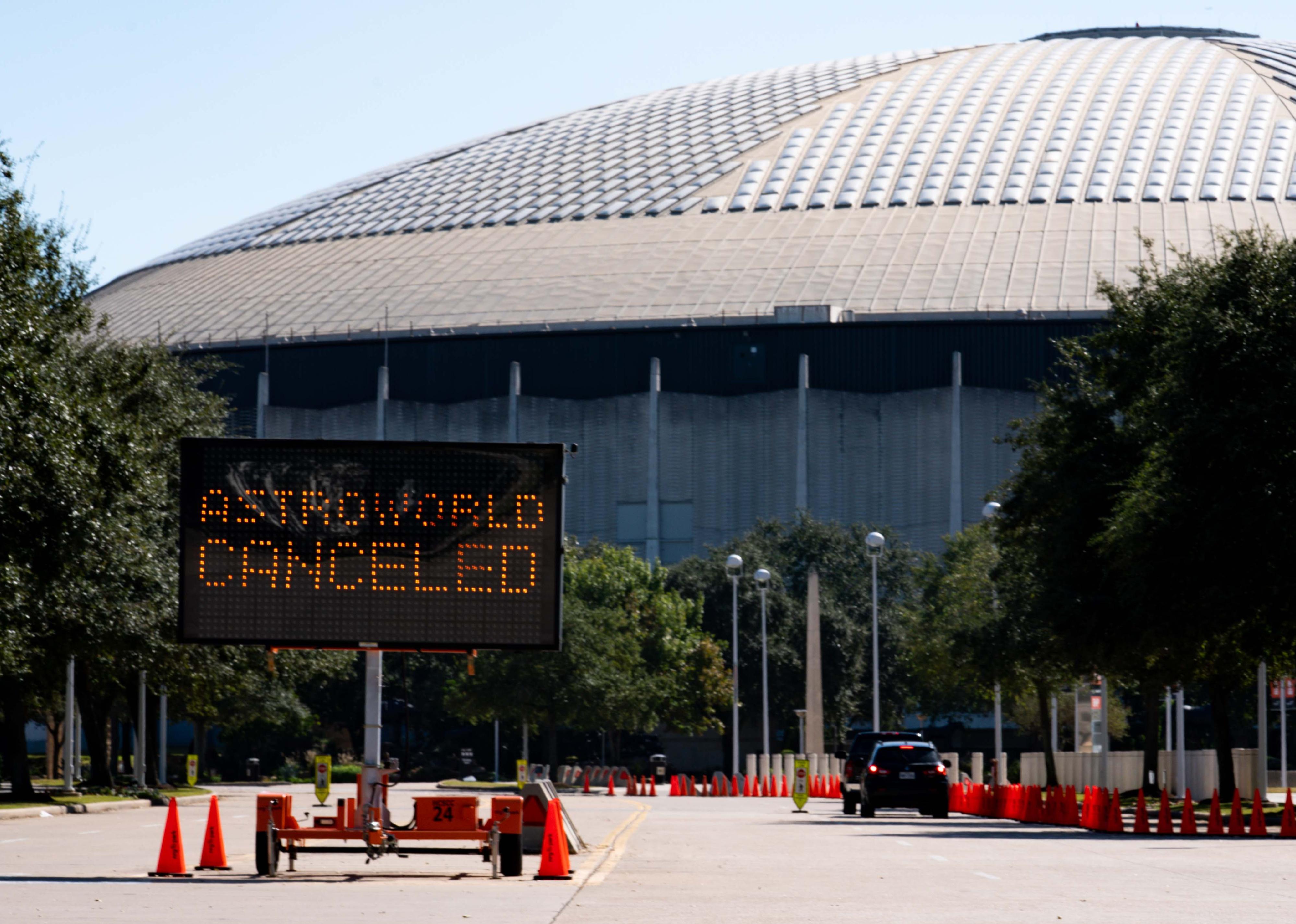 A street sign showing the cancellation of the AstroWorld Festival at NRG Park.