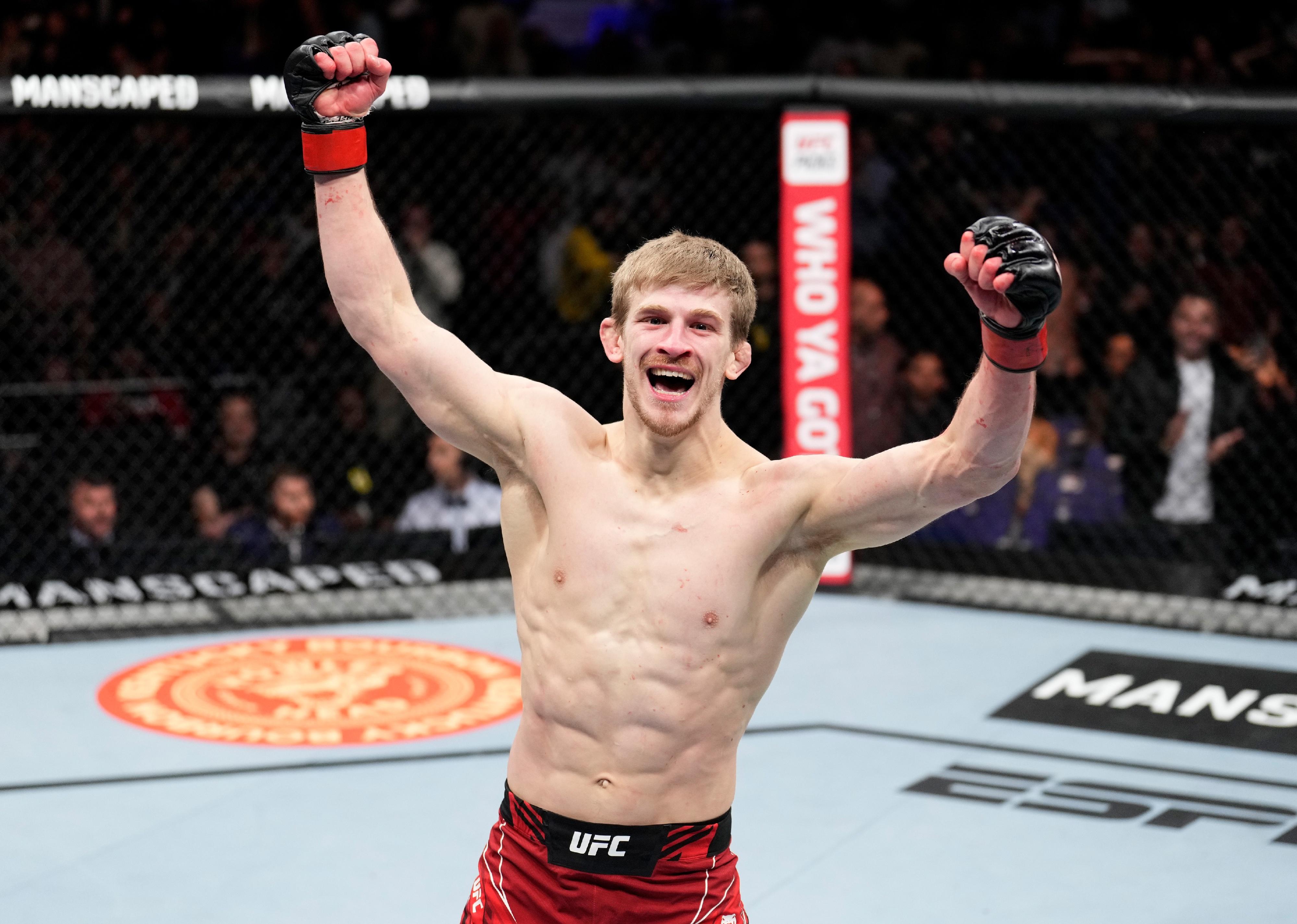 Arnold Allen celebrates his TKO victory over Dan Hooker.