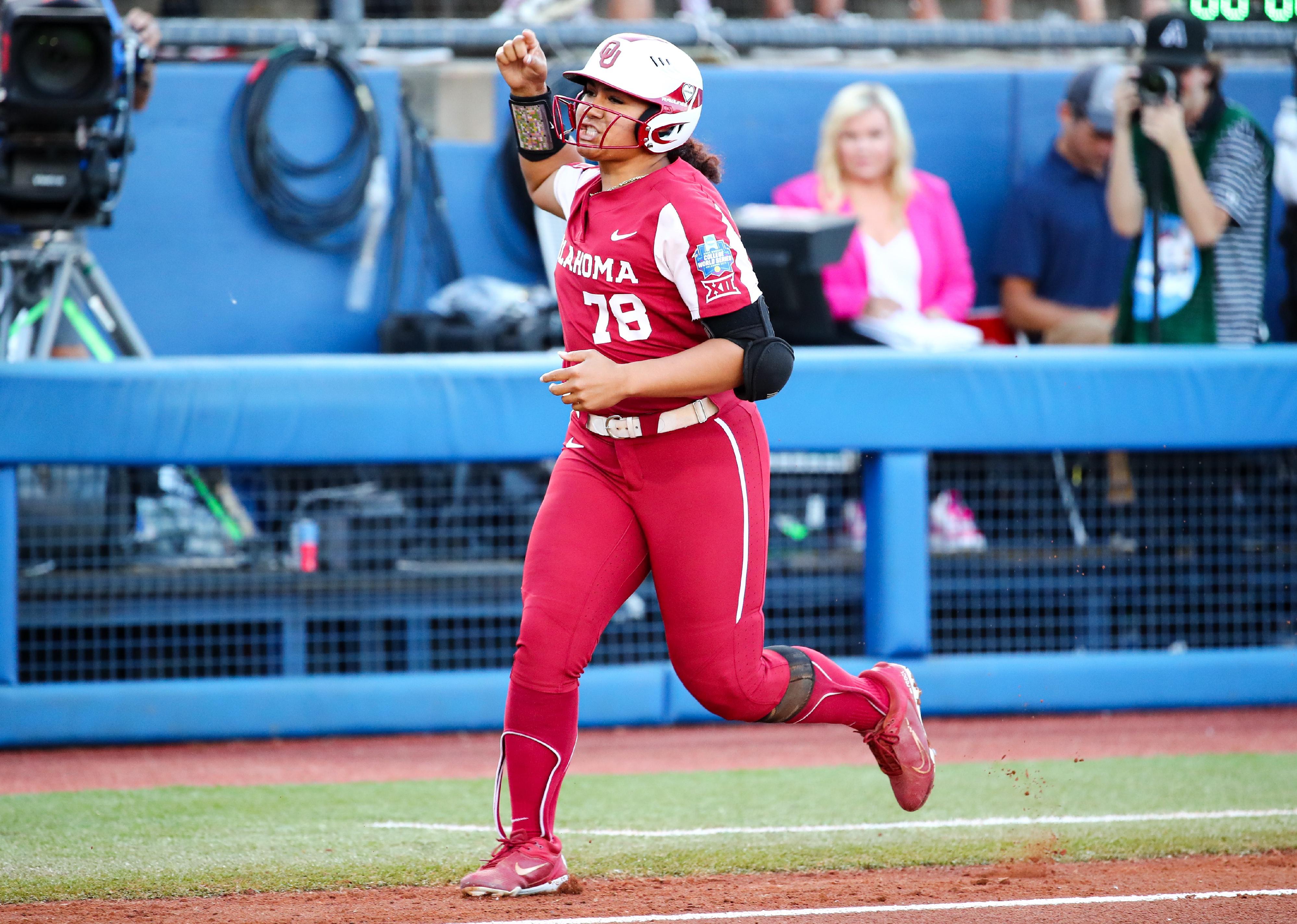 Jocelyn Alo of the Oklahoma Sooners celebrates a home run.