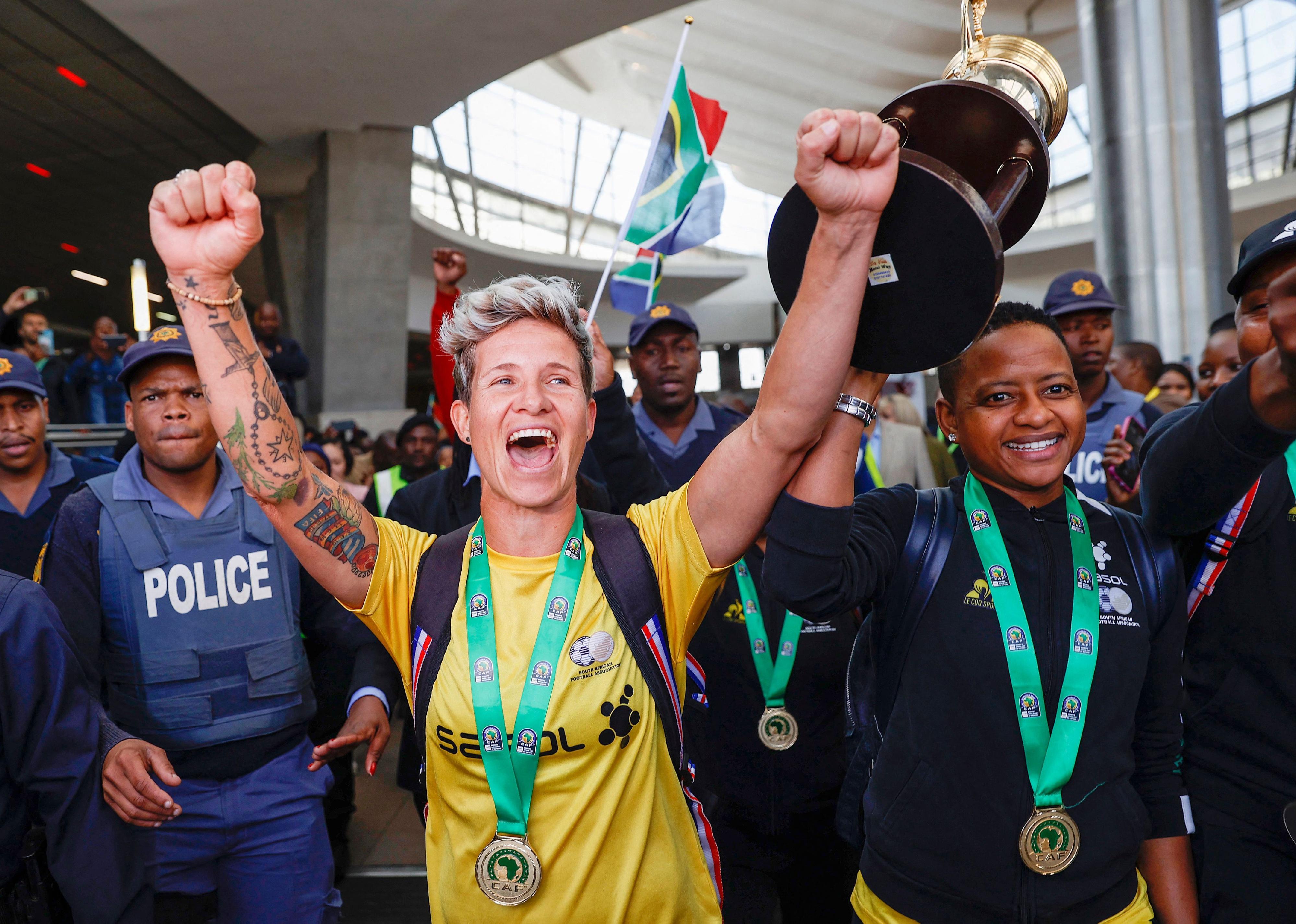 South African national women's team players Janine van Wyk and captain Refiloe Jane react after they won the 2022 Women's Africa Cup of Nations.