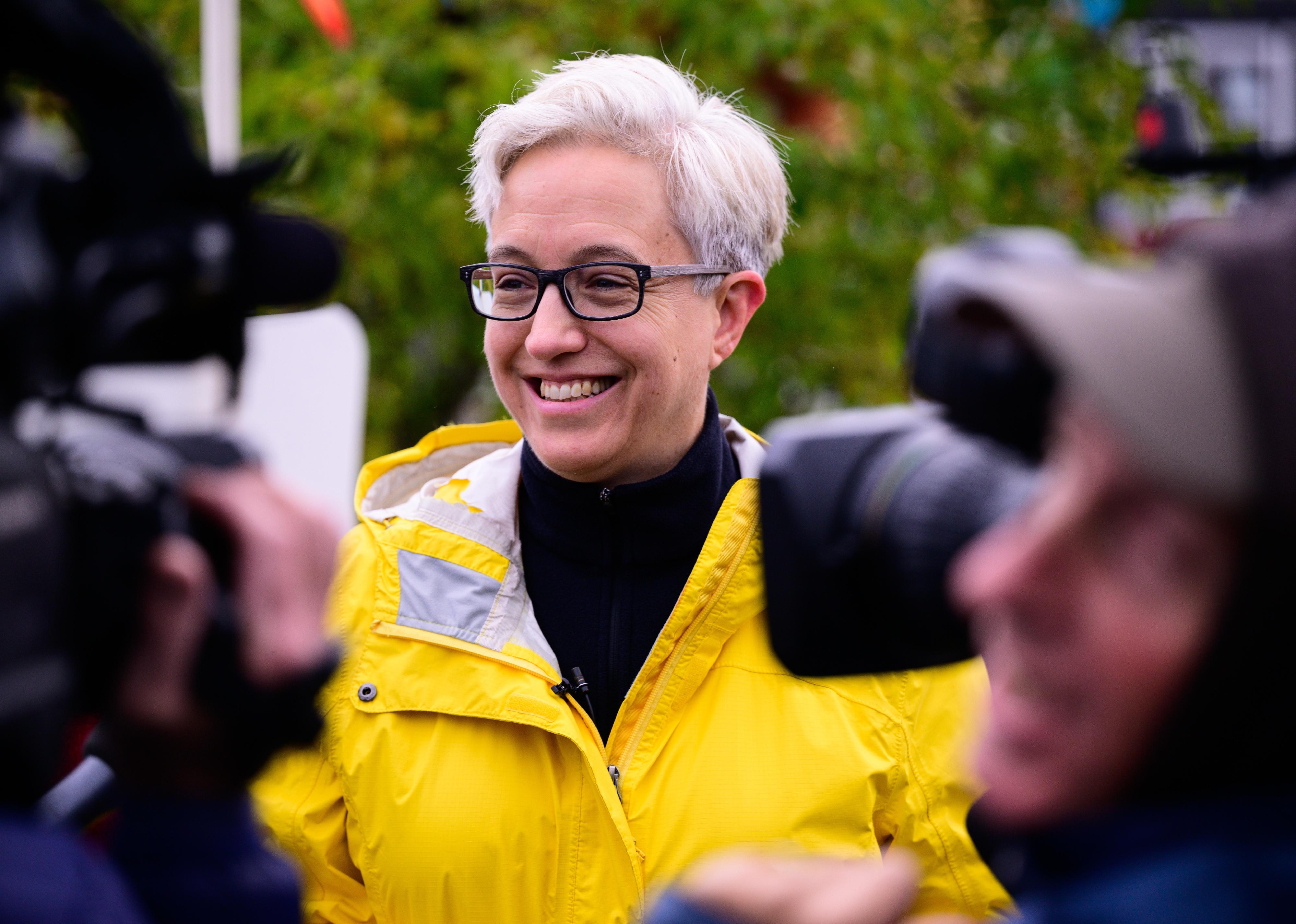 Tina Kotek speaks with members of the media.