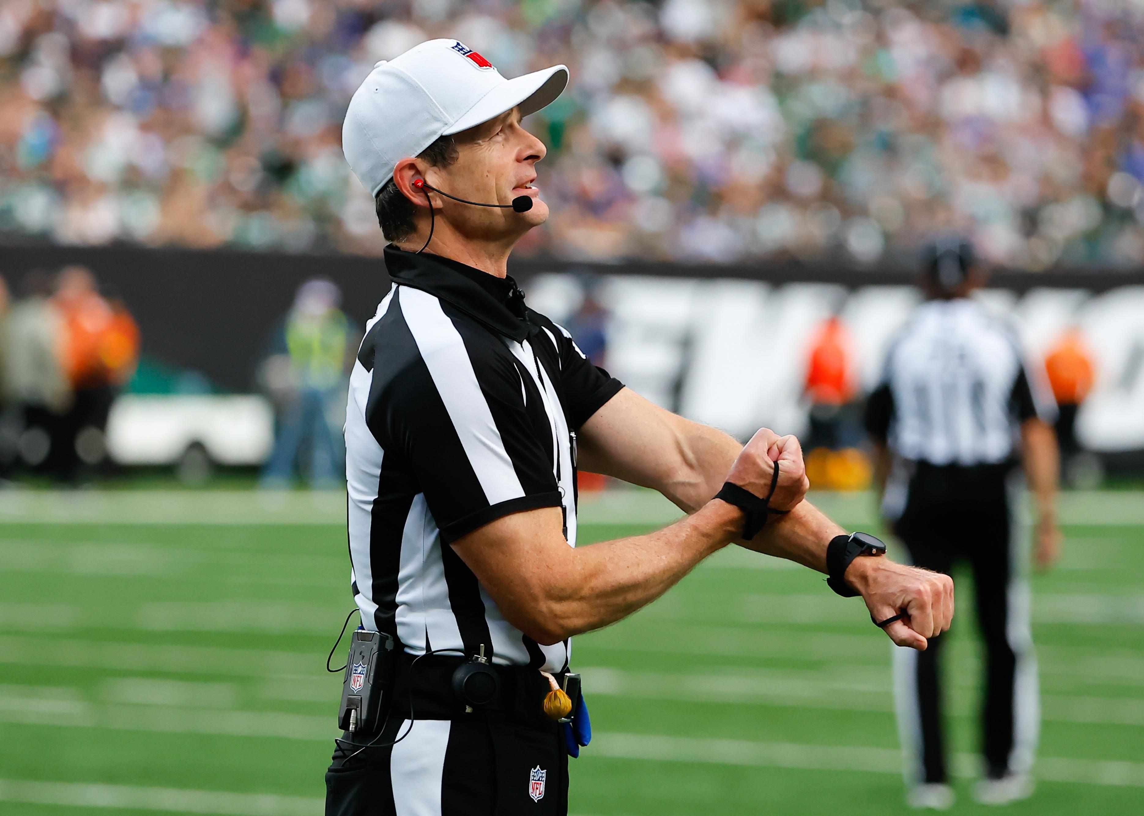 Referee Land Clark calls a penalty during a game between the New York Jets and Buffalo Bills.