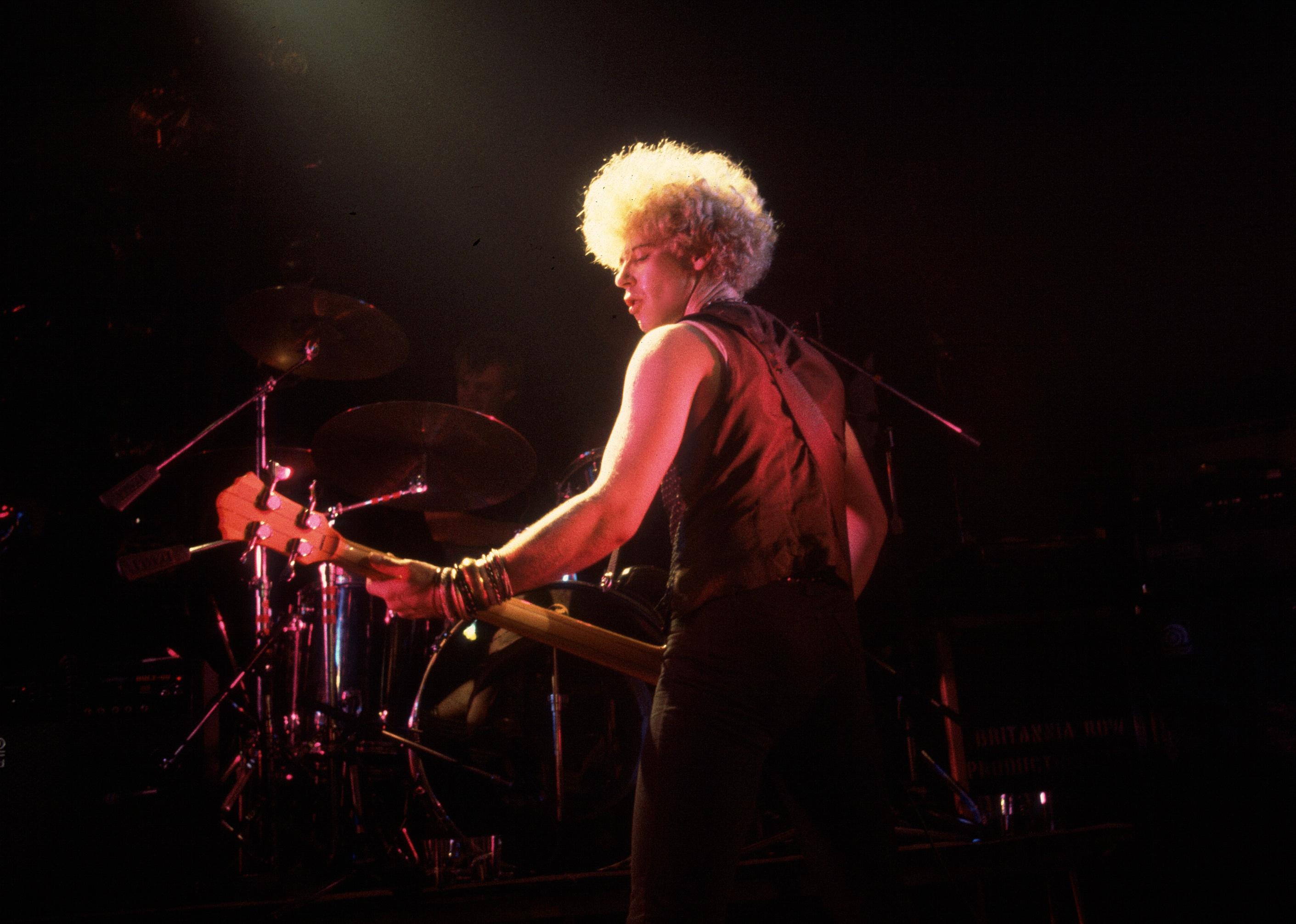 Adam Clayton of the group U2 performs onstage in Chicago, Illinois.