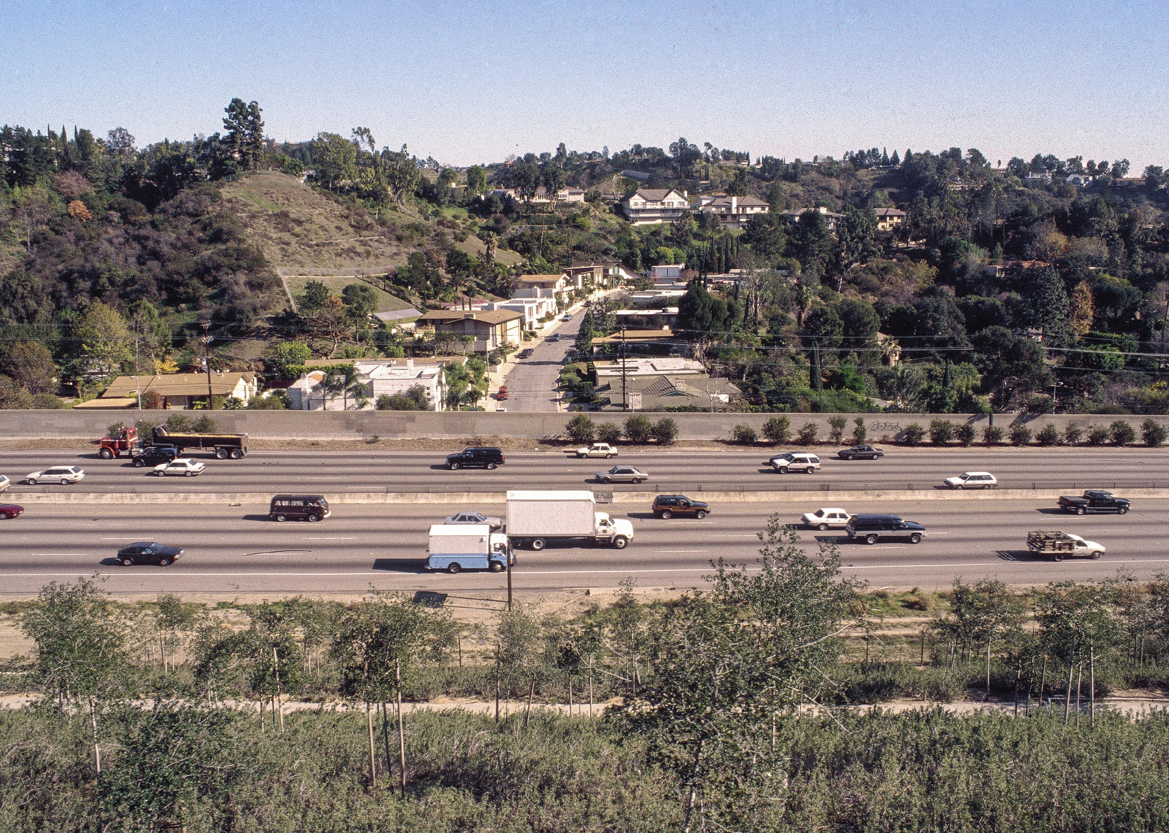 View of traffic on the 405 Freeway and the Bel Air neighborhood, 1997. 