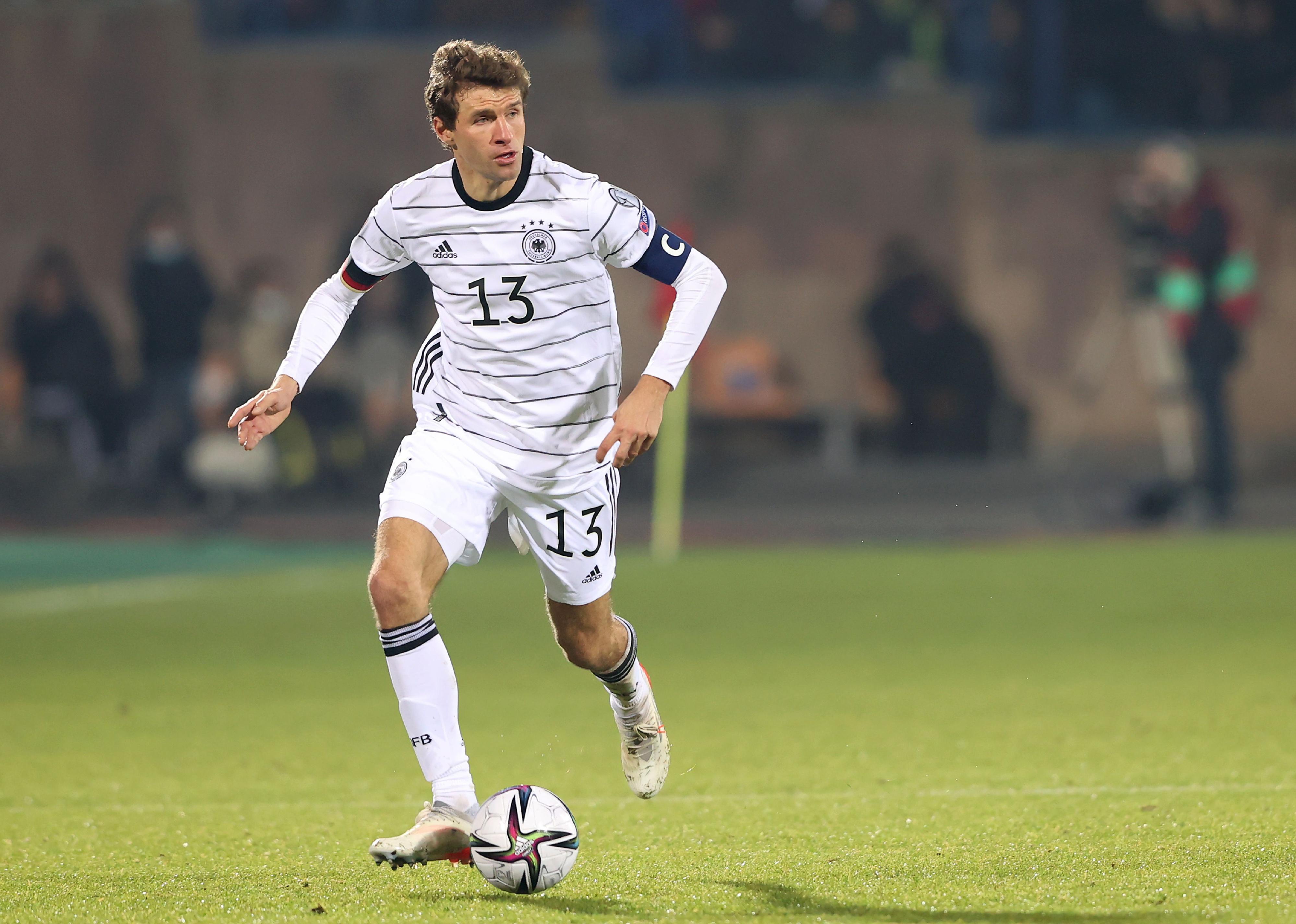 Thomas Müller runs with the ball during the 2022 FIFA World Cup Qualifier match between Armenia and Germany