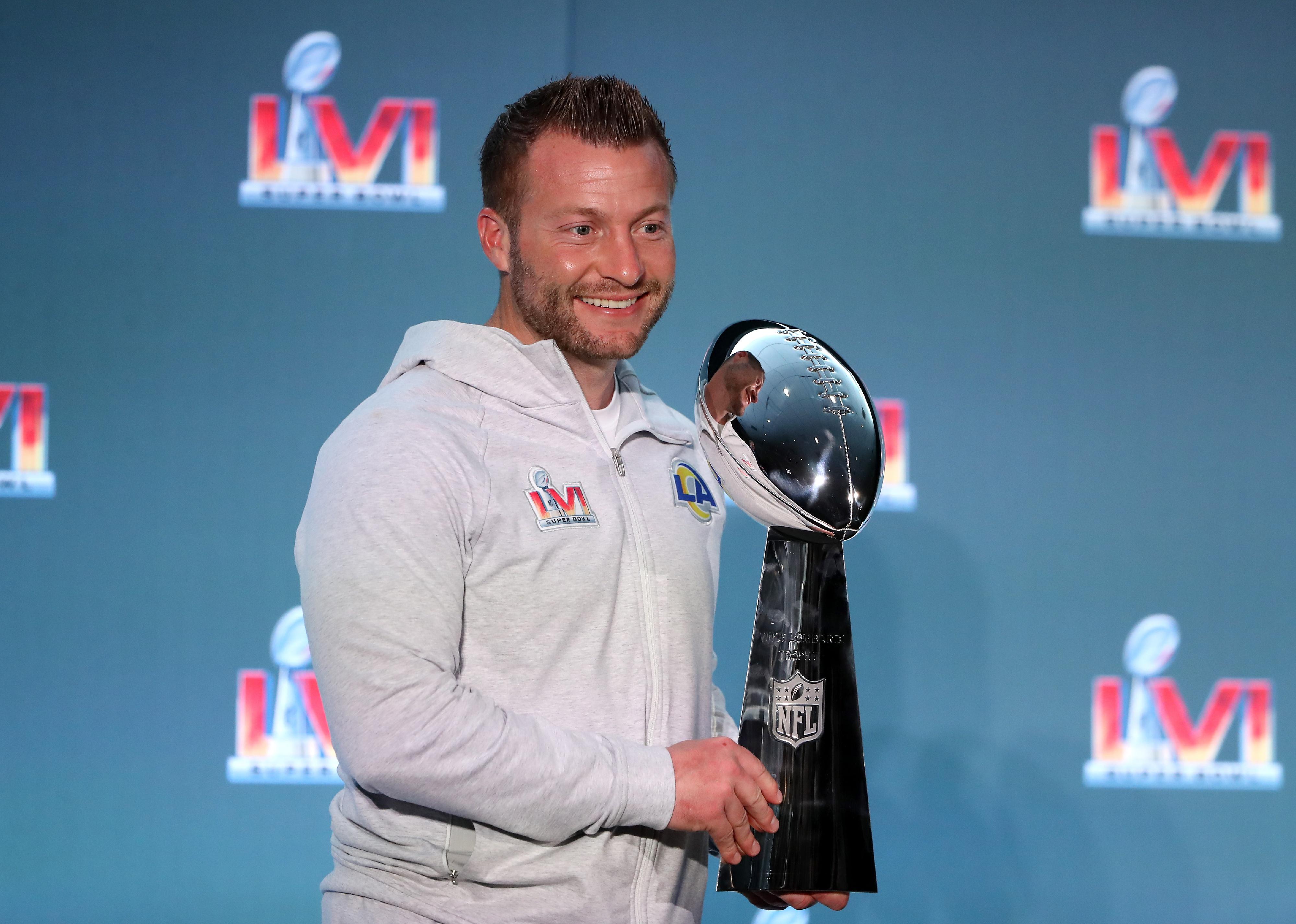 Sean McVay of the Los Angeles Rams poses with the Vince Lombardi Trophy.