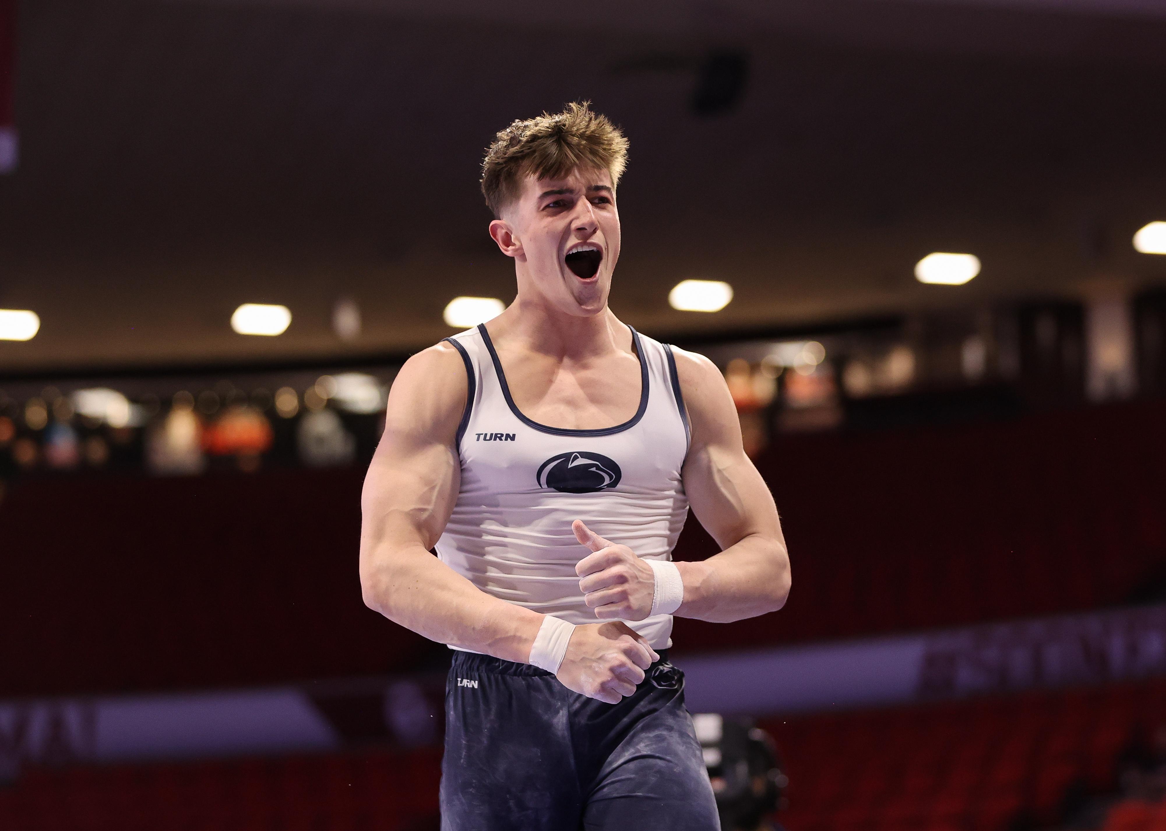 Michael Jaroh of Penn State reacts after competing in parallel bars.