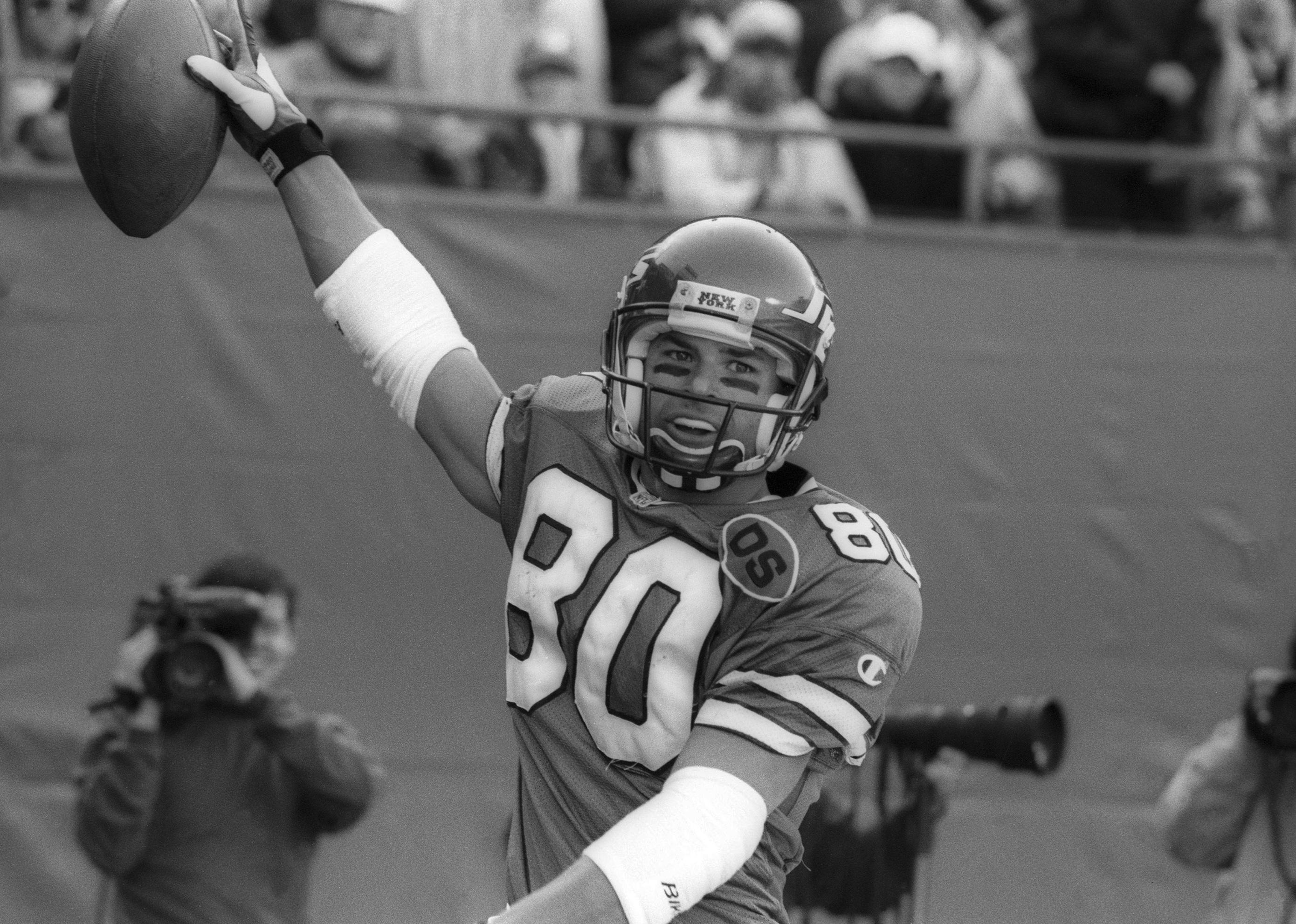 Wide receiver Wayne Chrebet of the New York Jets celebrates a touchdown.