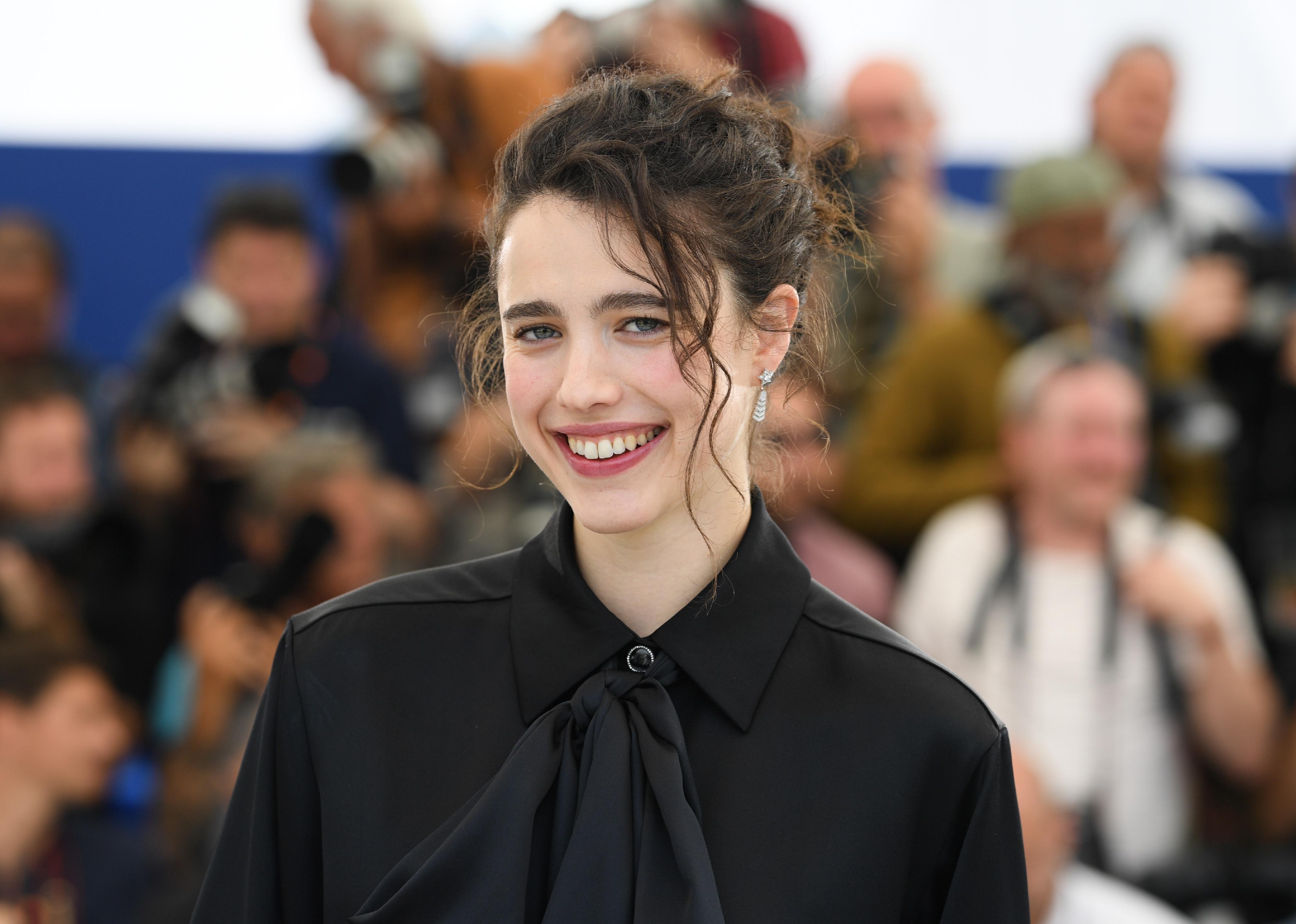 Margaret Qualley attends the photocall for "Stars At Noon".