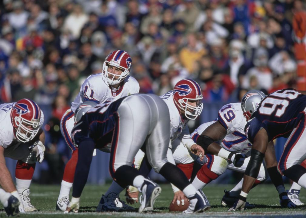 Rob Johnson calls the play on the line of scrimmage during a game against the New England Patriots.