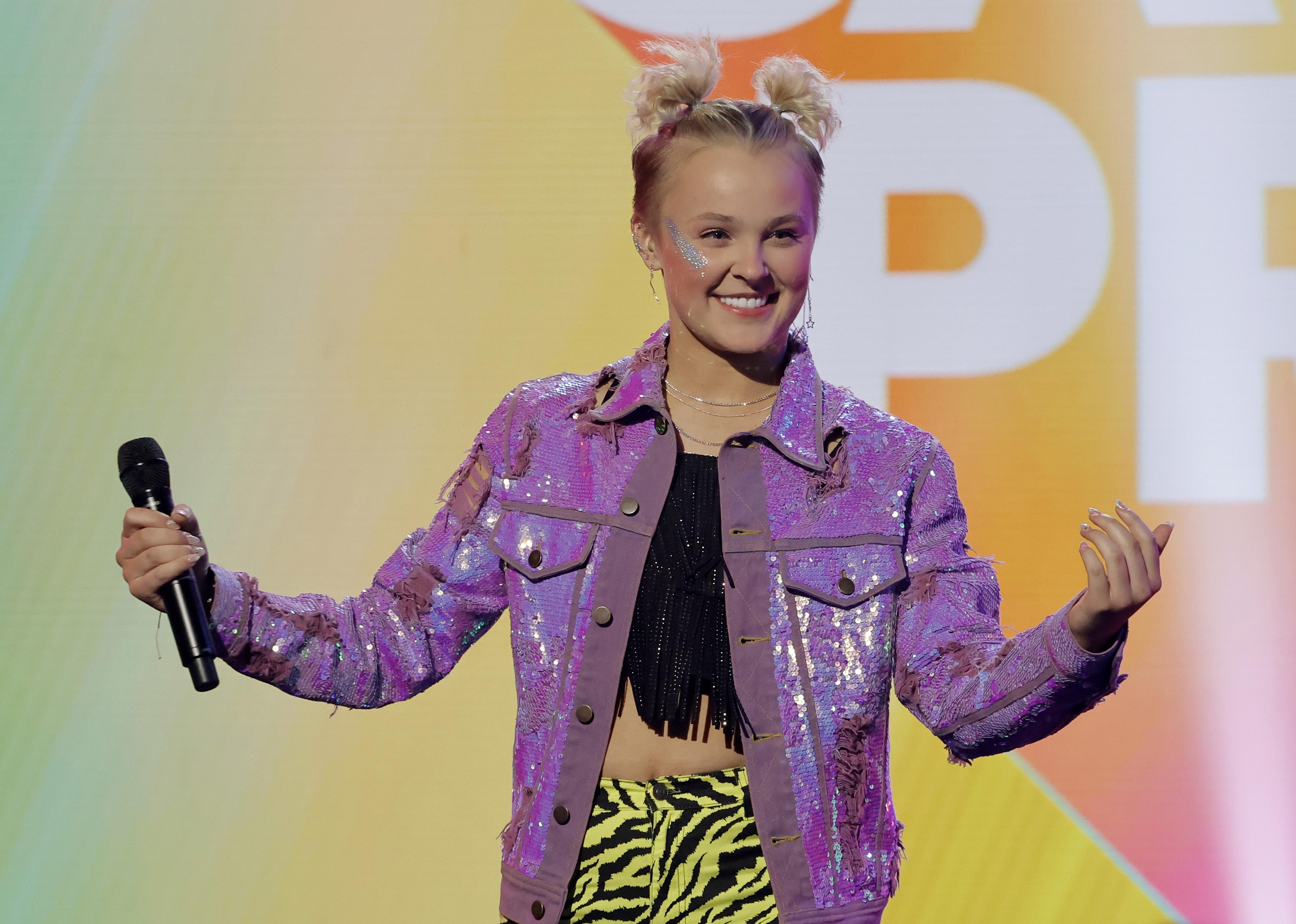 Jojo Siwa performs onstage.