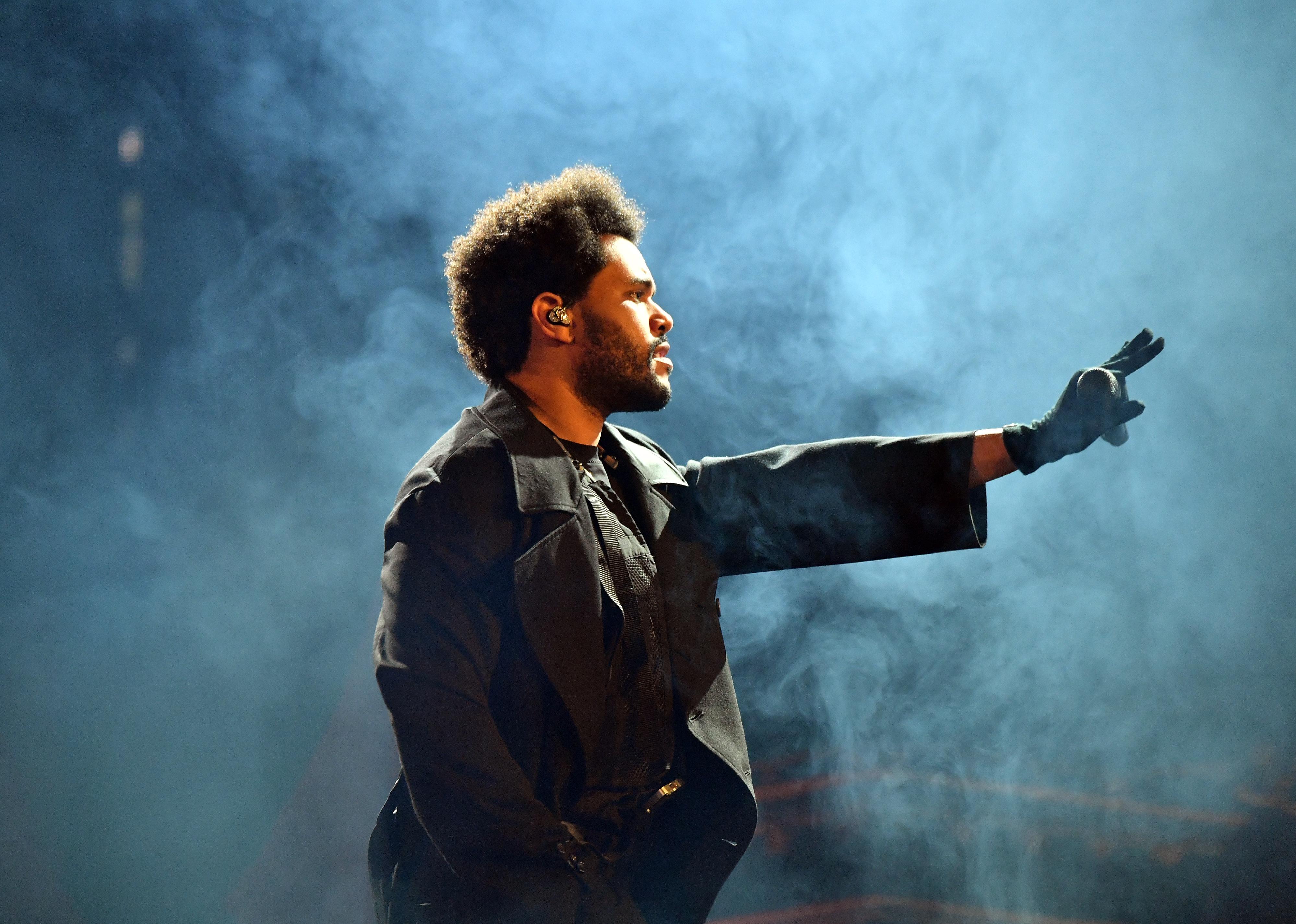 The Weeknd performs onstage during his "After Hours Til Dawn" tour.