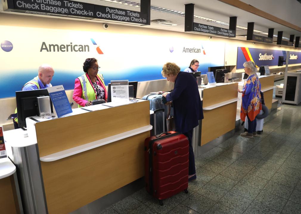 Passengers check-in for their flights on American Airlines at Long Island MacArthur Airport.