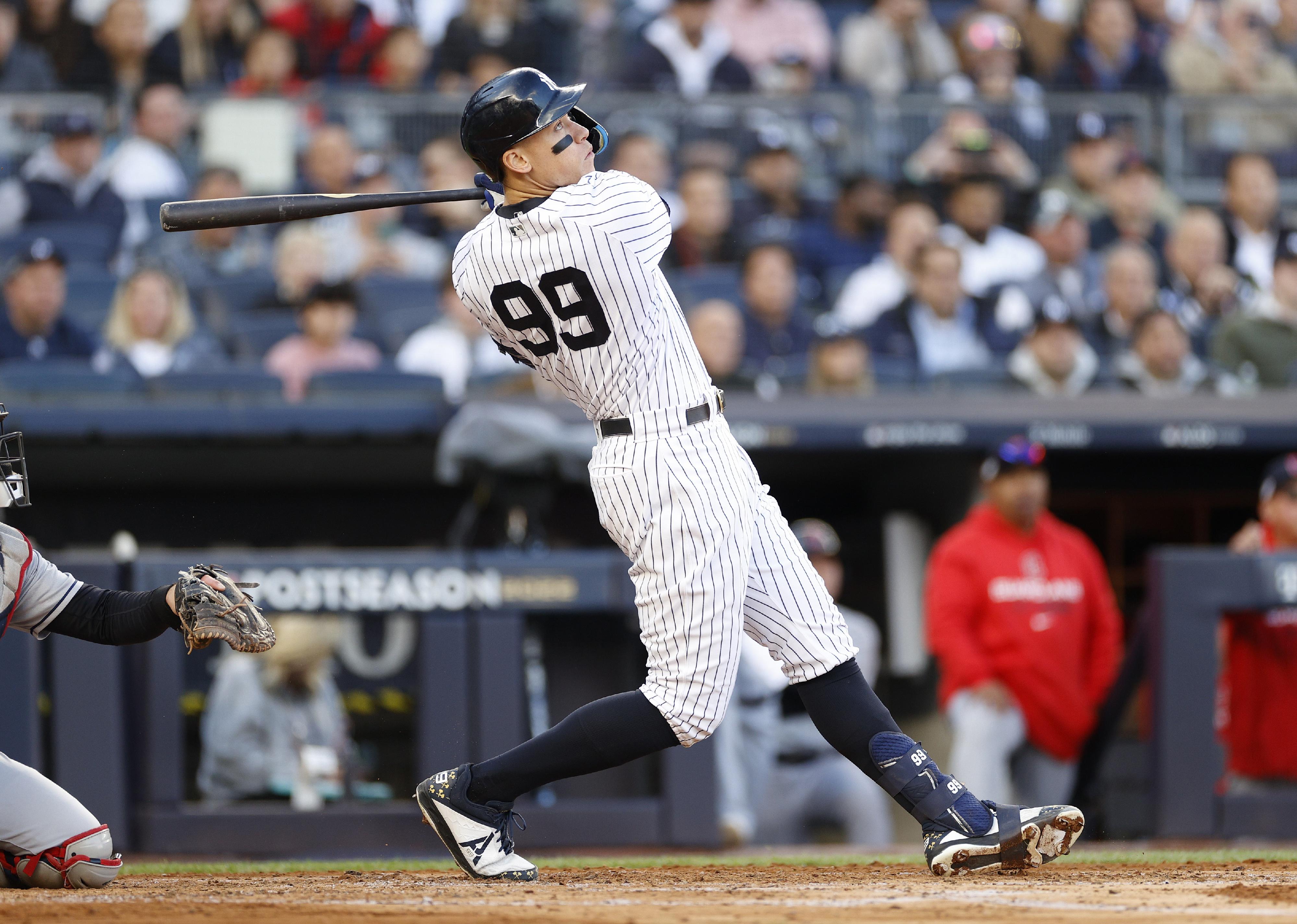 Aaron Judge of the New York Yankees hits a home run.