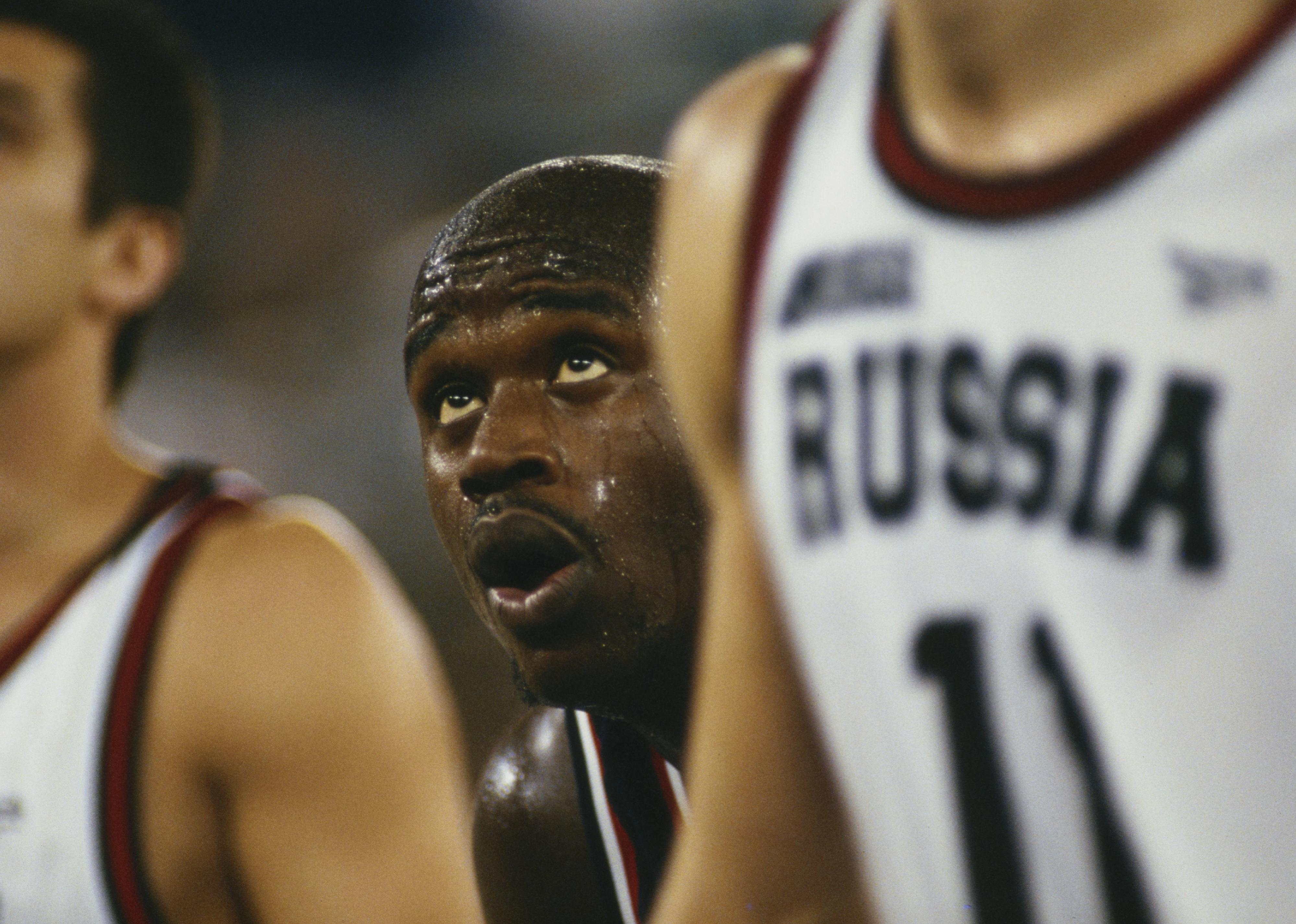 Shaquille O'Neal, framed by two Russian players, during the final of the 1994 FIBA World Championship.