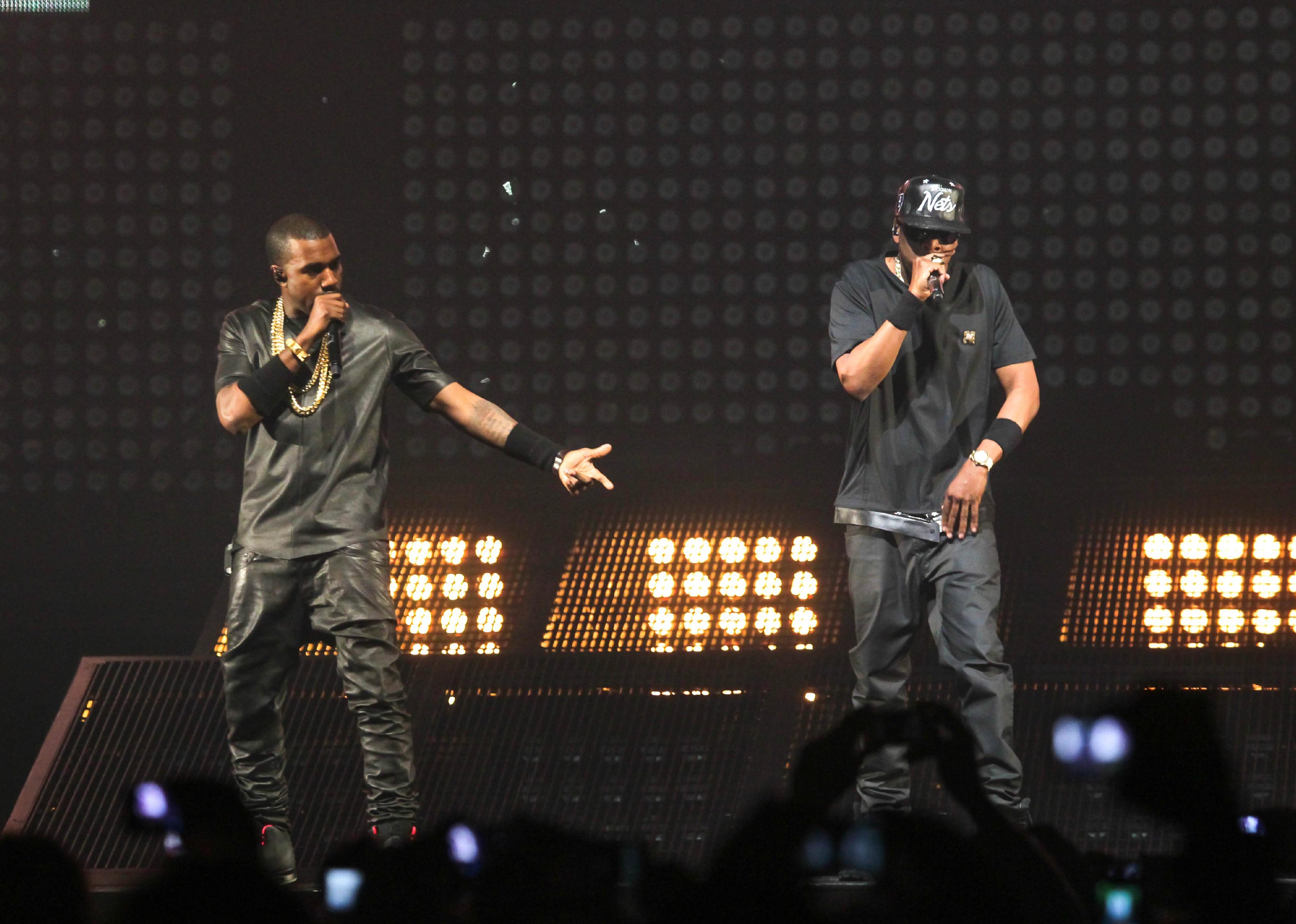 Rappers Jay-Z and Kanye West performing during the Watch The Throne Tour.