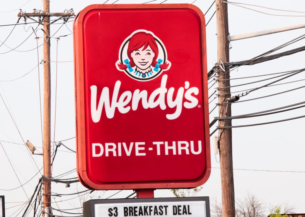 A Wendy's Drive-Thru sign with a sign underneath reading $3 breakfast deal.