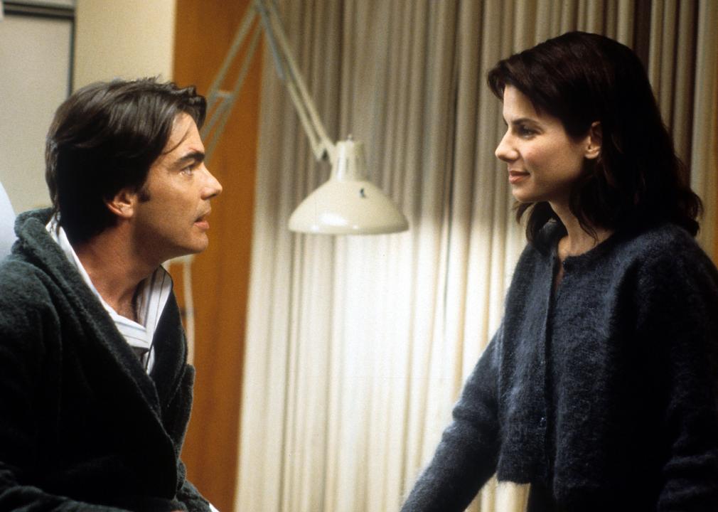 Peter Gallagher is visited by Sandra Bullock in a scene from the film 'While You Were Sleeping'. 