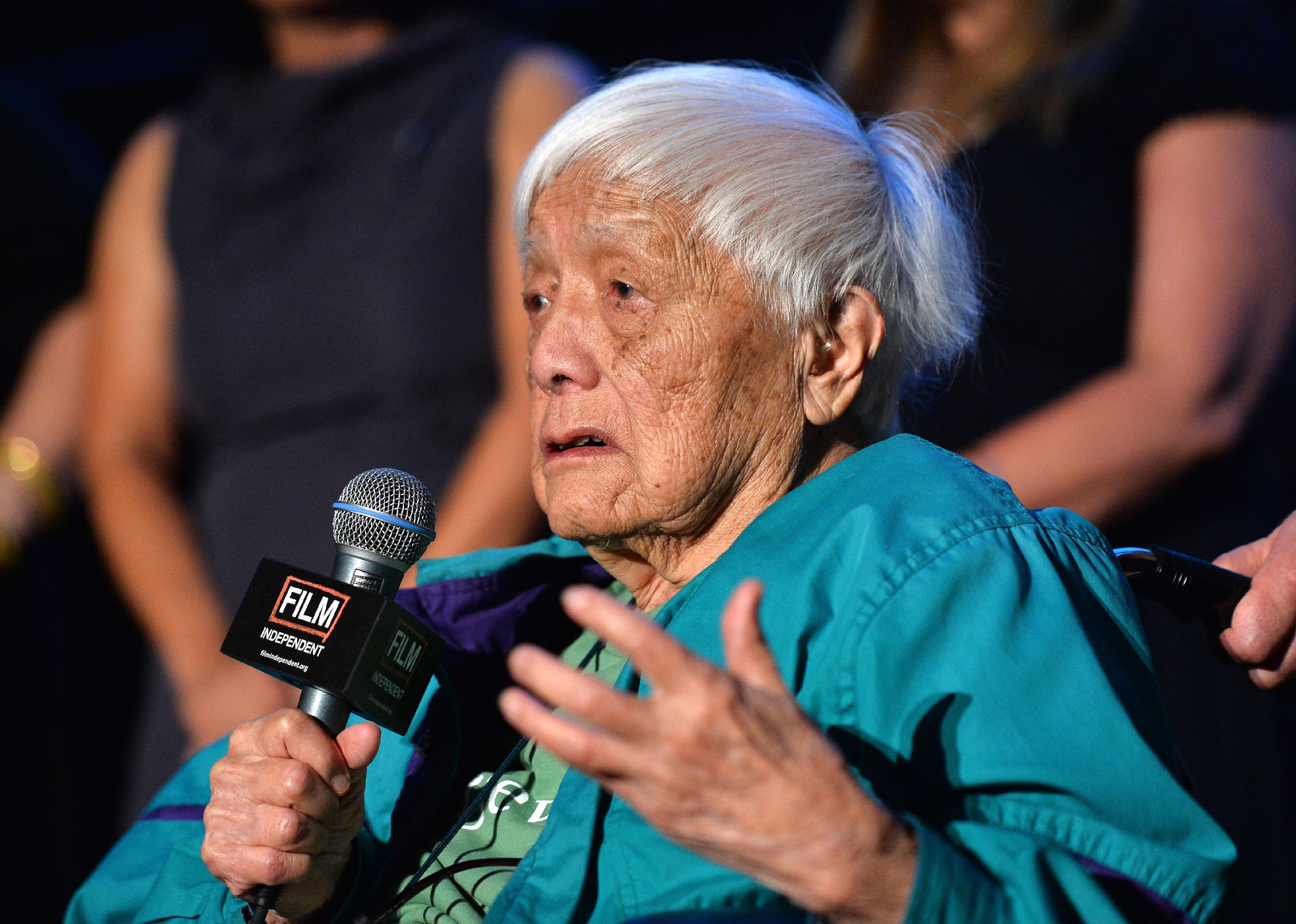  Documentary subject Grace Lee Boggs speaks on stage at the "American Revolutionary" premiere.