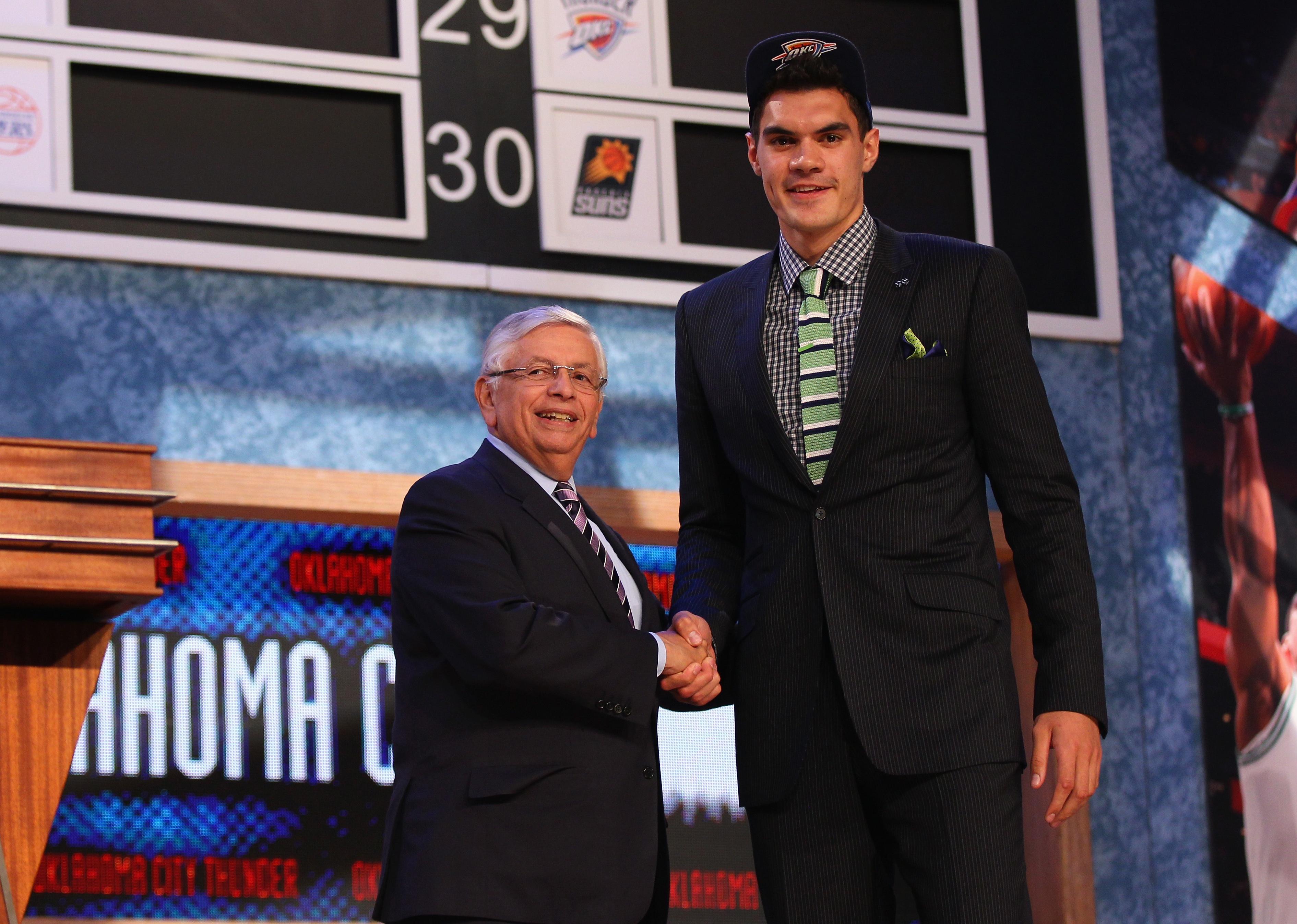 Steven Adams with NBA Commissioner David Stern after Adams was drafted.