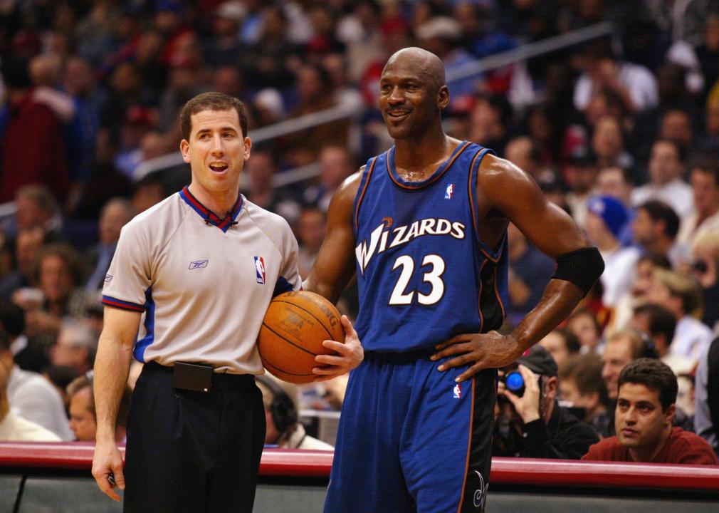 Michael Jordan #23 of the Washington Wizards talks with referee Tim Donaghy.