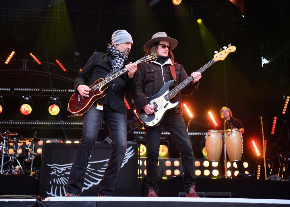 Damon Johnson and Keith Christopher of Lynyrd Skynyrd perform on stage.