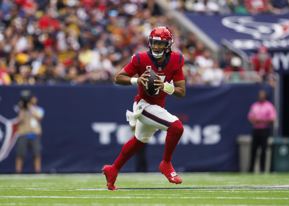 C.J. Stroud #7 of the Houston Texans rolls out and looks to throw a pass.